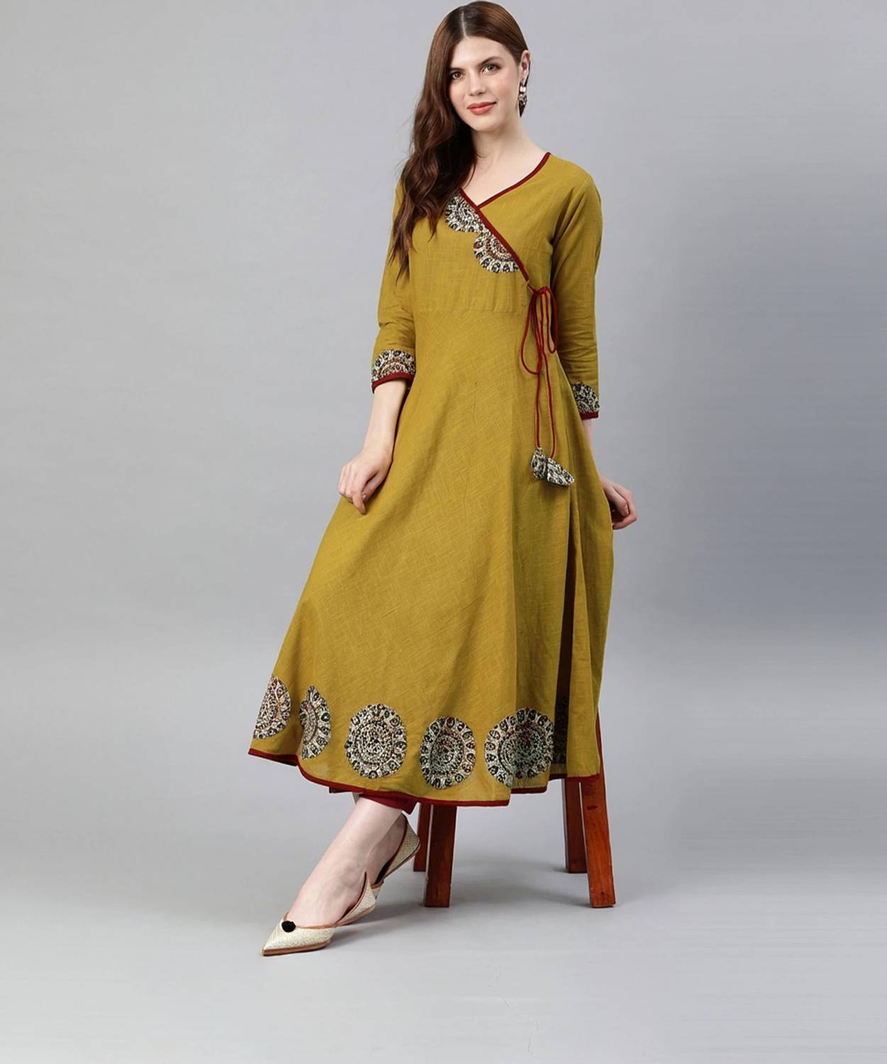 IKRASS Women Solid Cotton Blend Anarkali Kurta (Yellow)