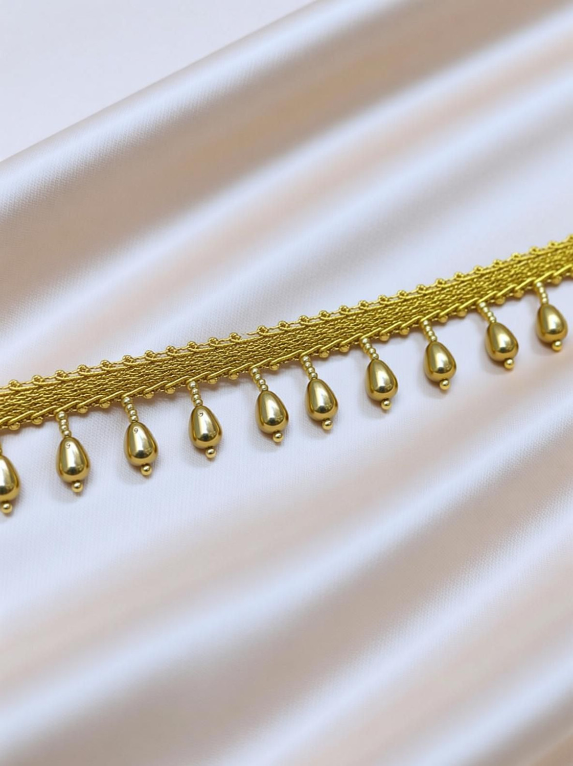 Image of DIVARA DIVARAGolden hanging pearl 4050(pack of 4meter) With Beautiful design , used in saree , suit, and many more purpose. Lace Reel