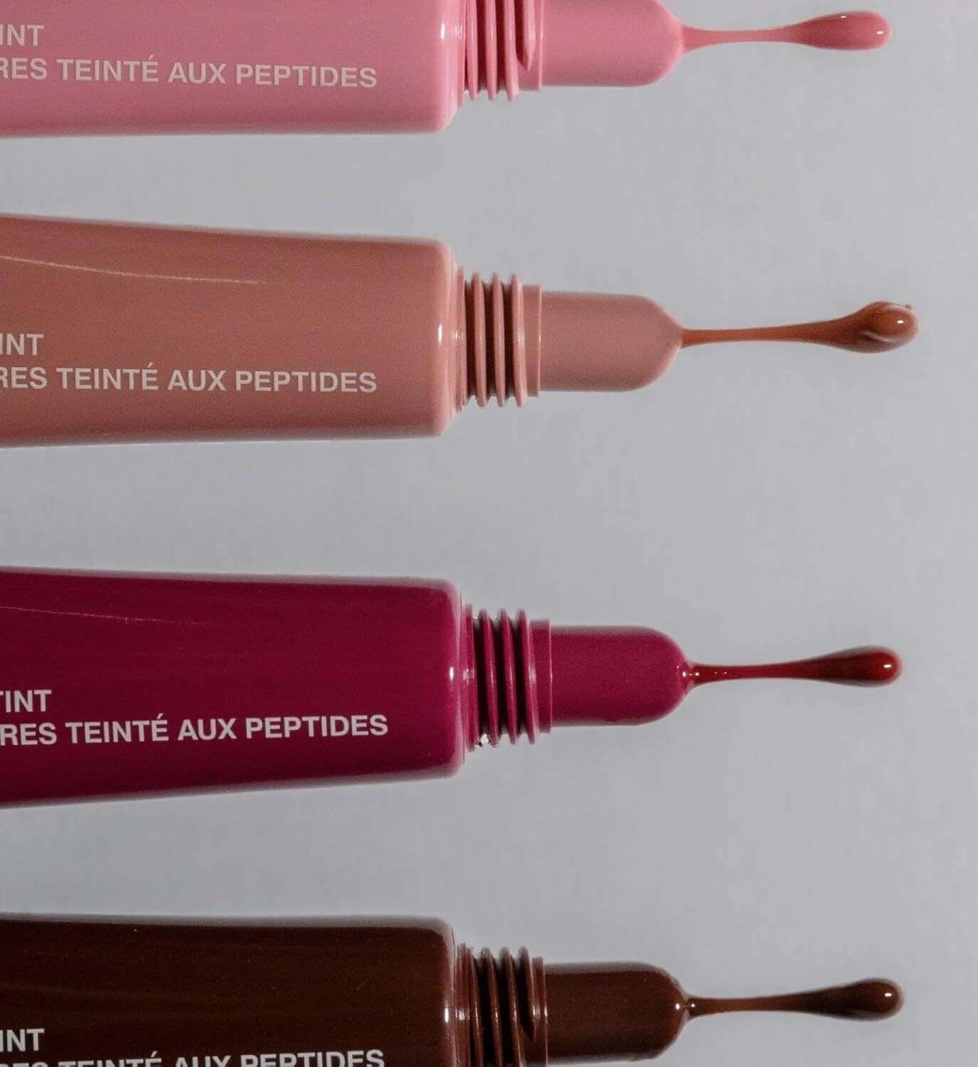 Image of Rhode Peptide Lip Tint & Gloss - Hydrating Lip Care Tint Toast, Raspberry Jelly, Ribbon, Espresso