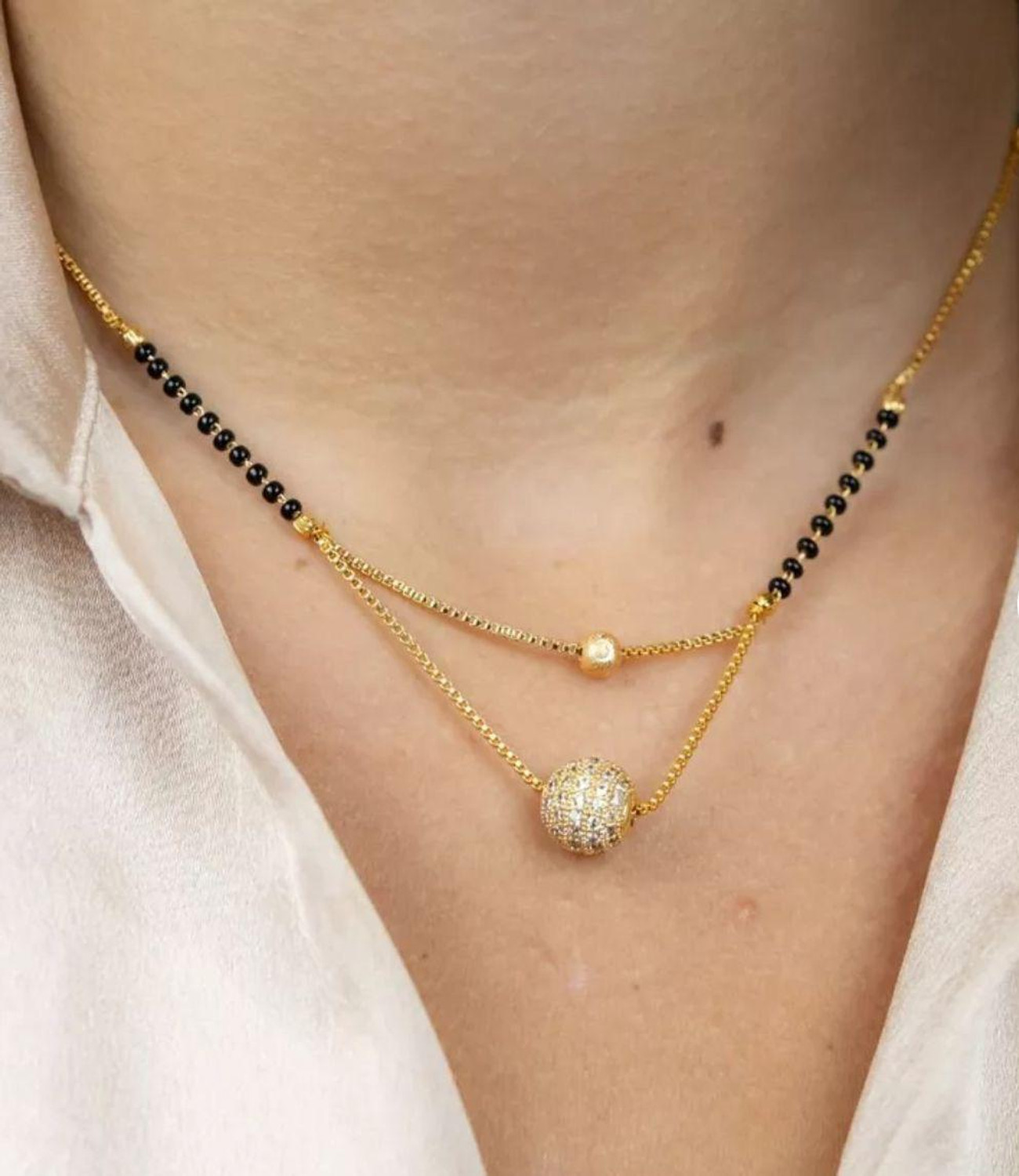 Image of SHUBHSUTRA Delicate Single-Line Designer AD ball Pendant Brass Mangalsutra
