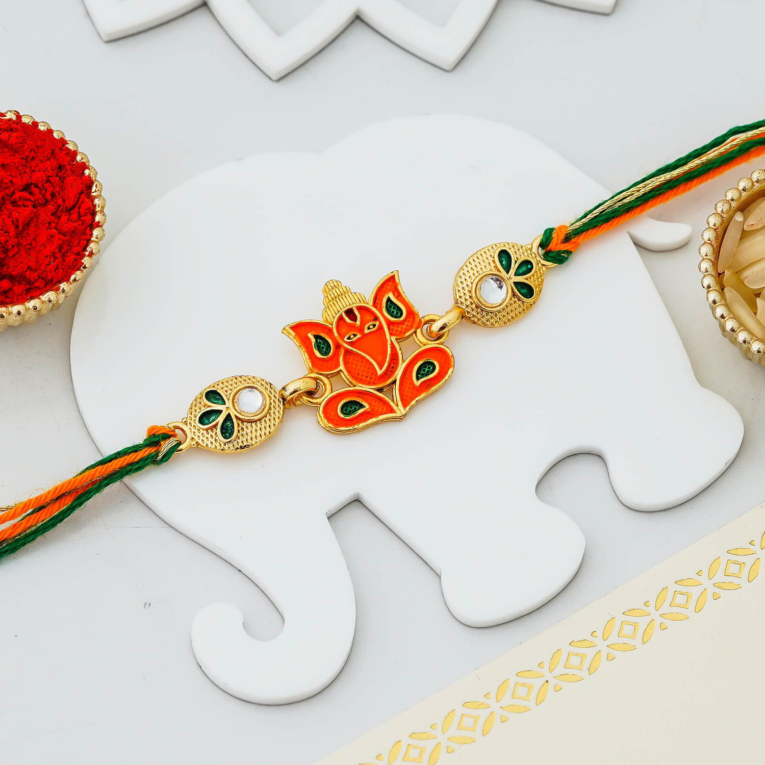 Image of Religious Ganesha Rakhi, Chawal Roli Pack Set by eCraftIndia