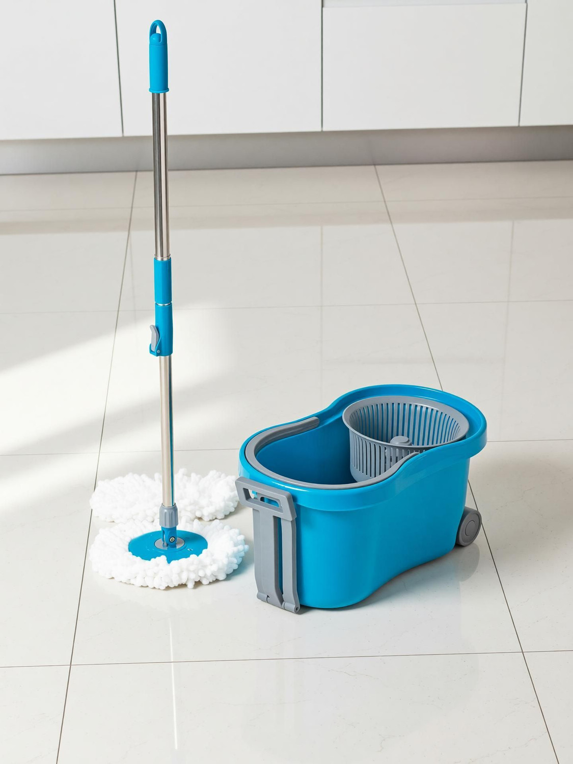 Image of Flipkart SmartBuy Spin Mop, Oval Bucket with Plastic Basket, 2 Microfiber Refills Mop Set