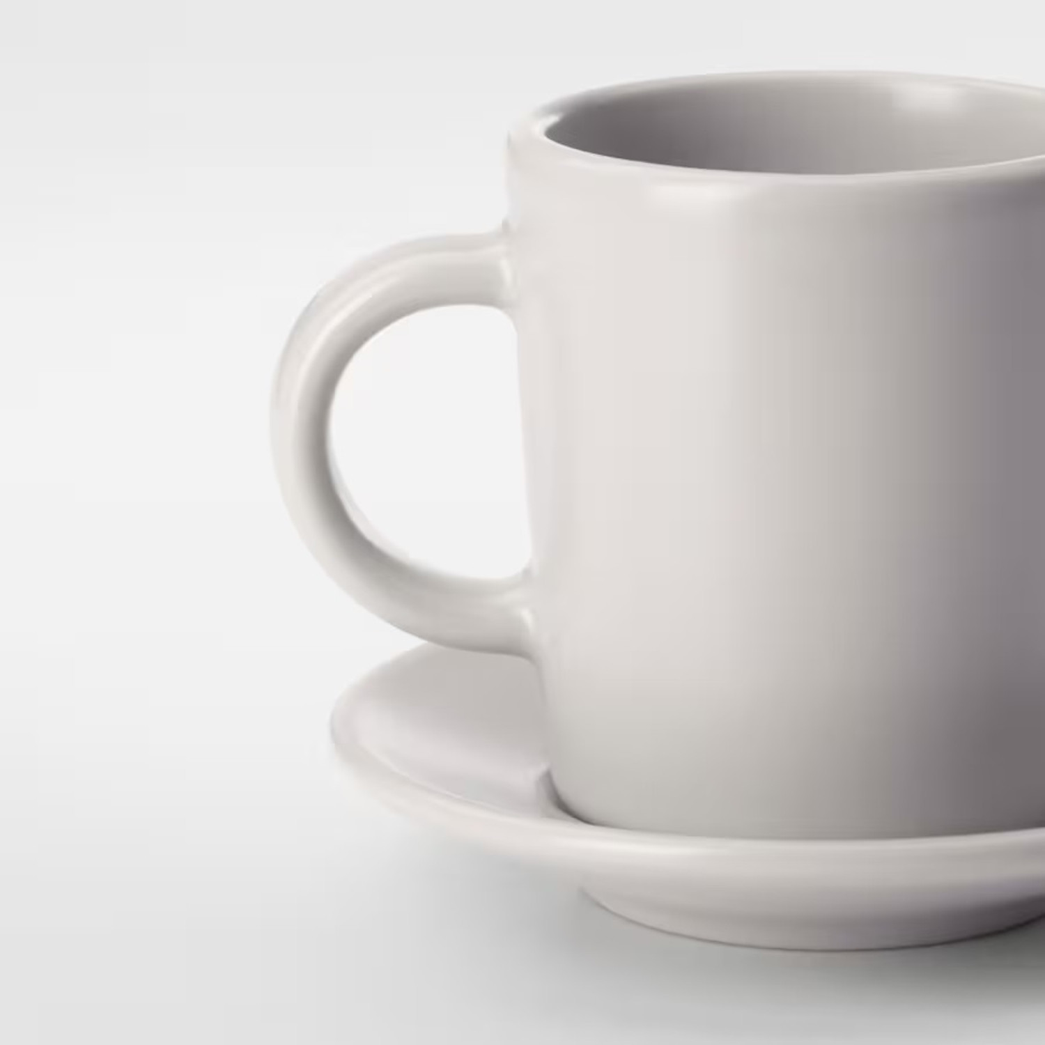 Image of IKEA Espresso cup and saucer, beige, 9 cl (3 oz) Glass Coffee Mug