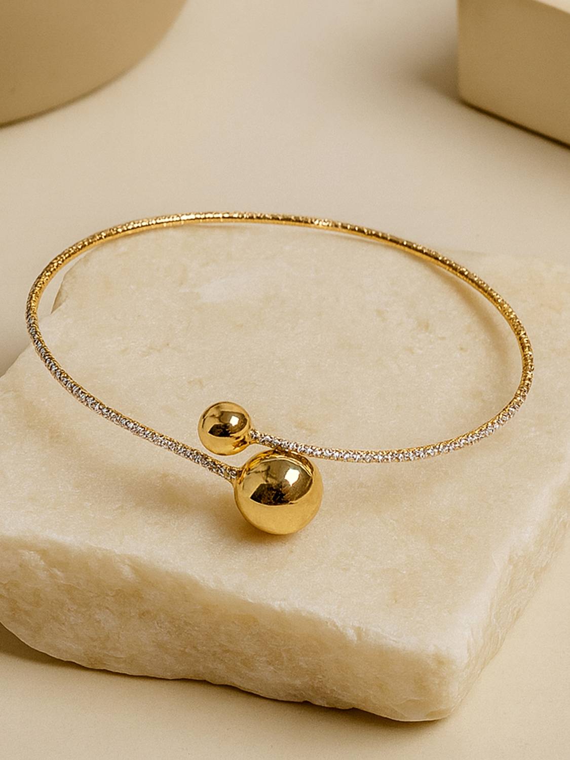 Bohey by KARATCART Modern Gold-Tone Hasli Necklace with Dual Ball Accents and Crystal Detailing Gold-plated Plated Alloy Necklace