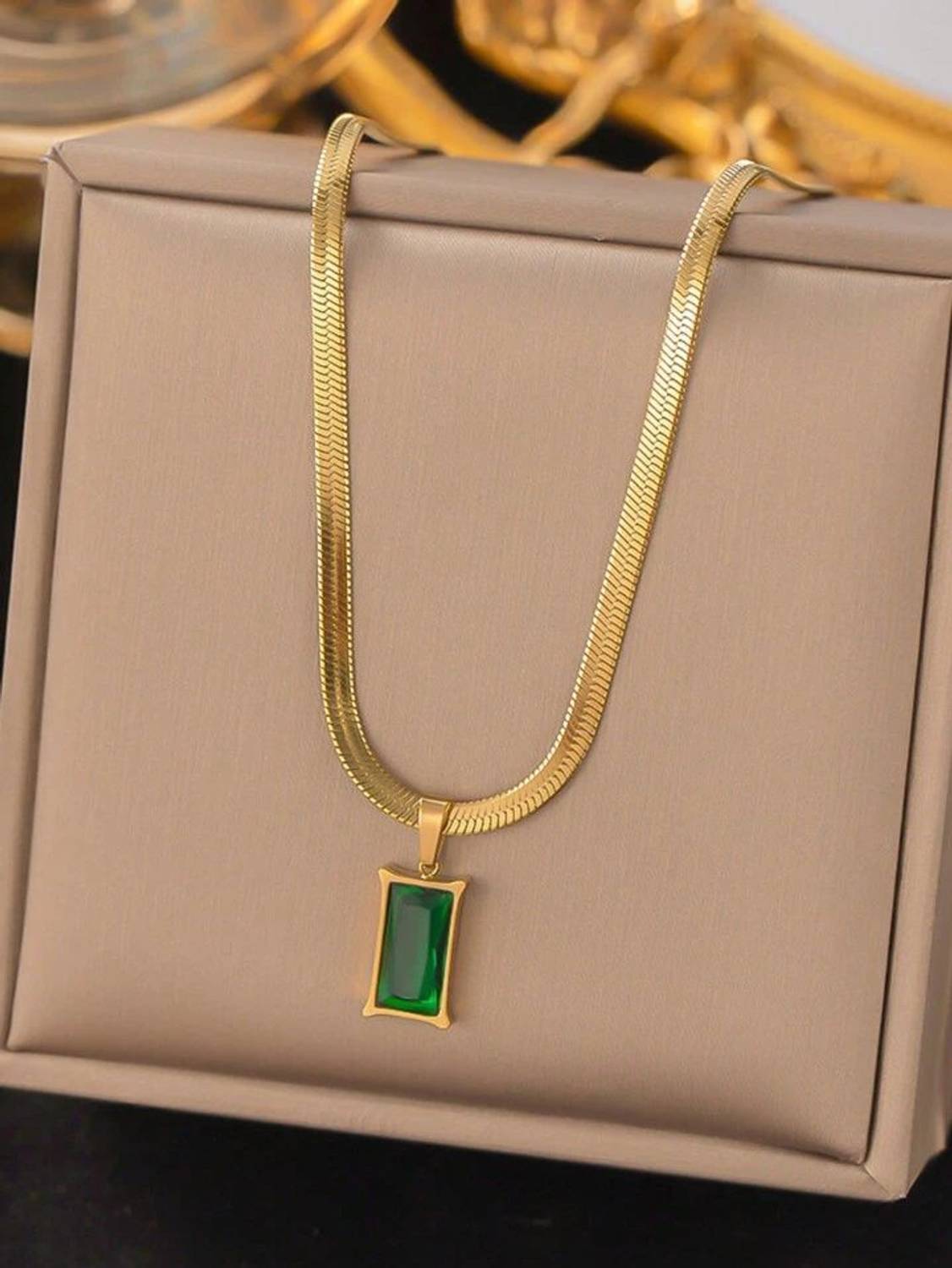 BHAVIKADECOR Green Emerald Pendant Gold-Plated Flat Snake Chain Necklace for Women & Girls Stainless Steel Pendant deal from flipkart