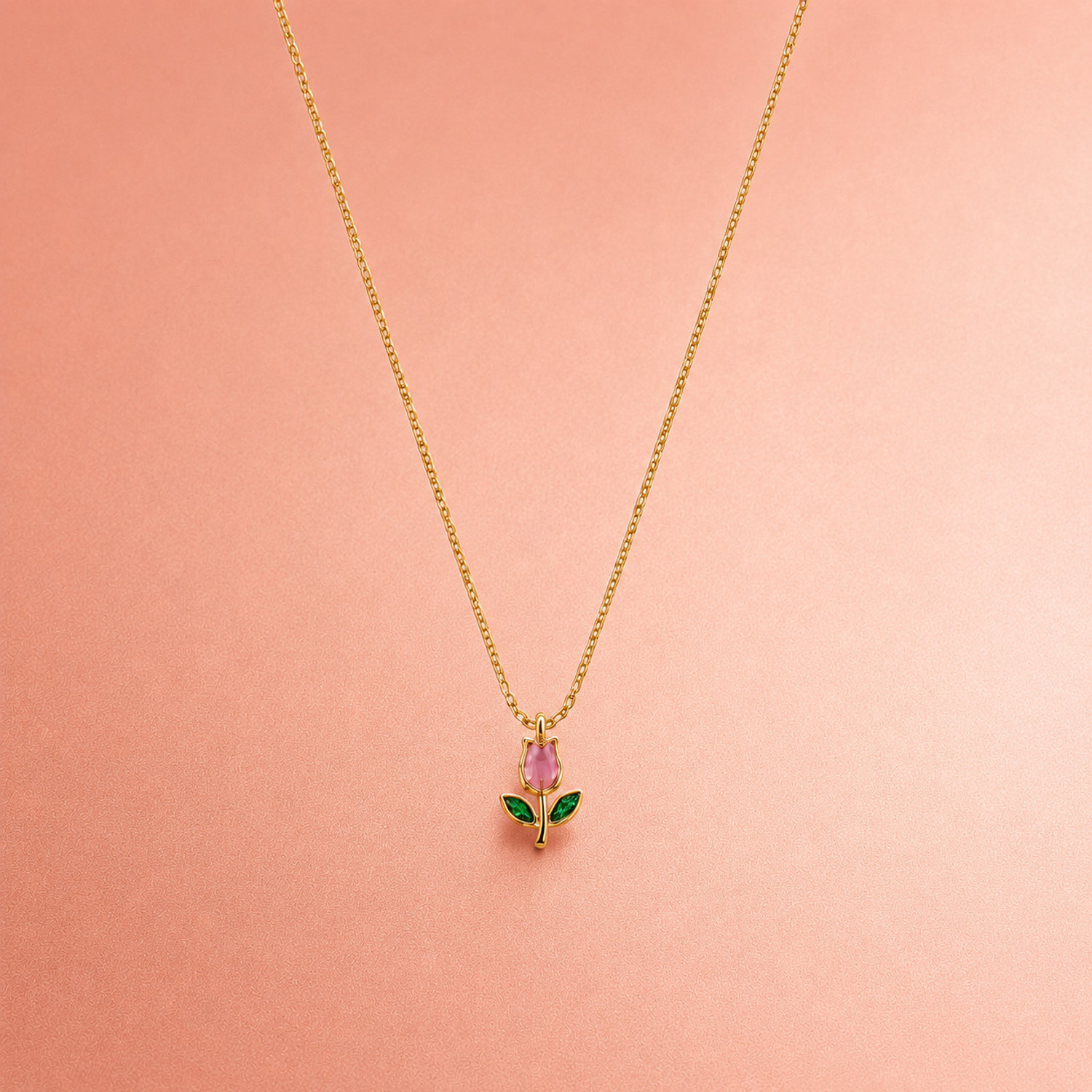 Ivaan Collections Gold Flower Pendant Necklace for Women with Pink Crystal & Green Leaf Charm Gold-plated Cubic Zirconia Stainless Steel Locket Set