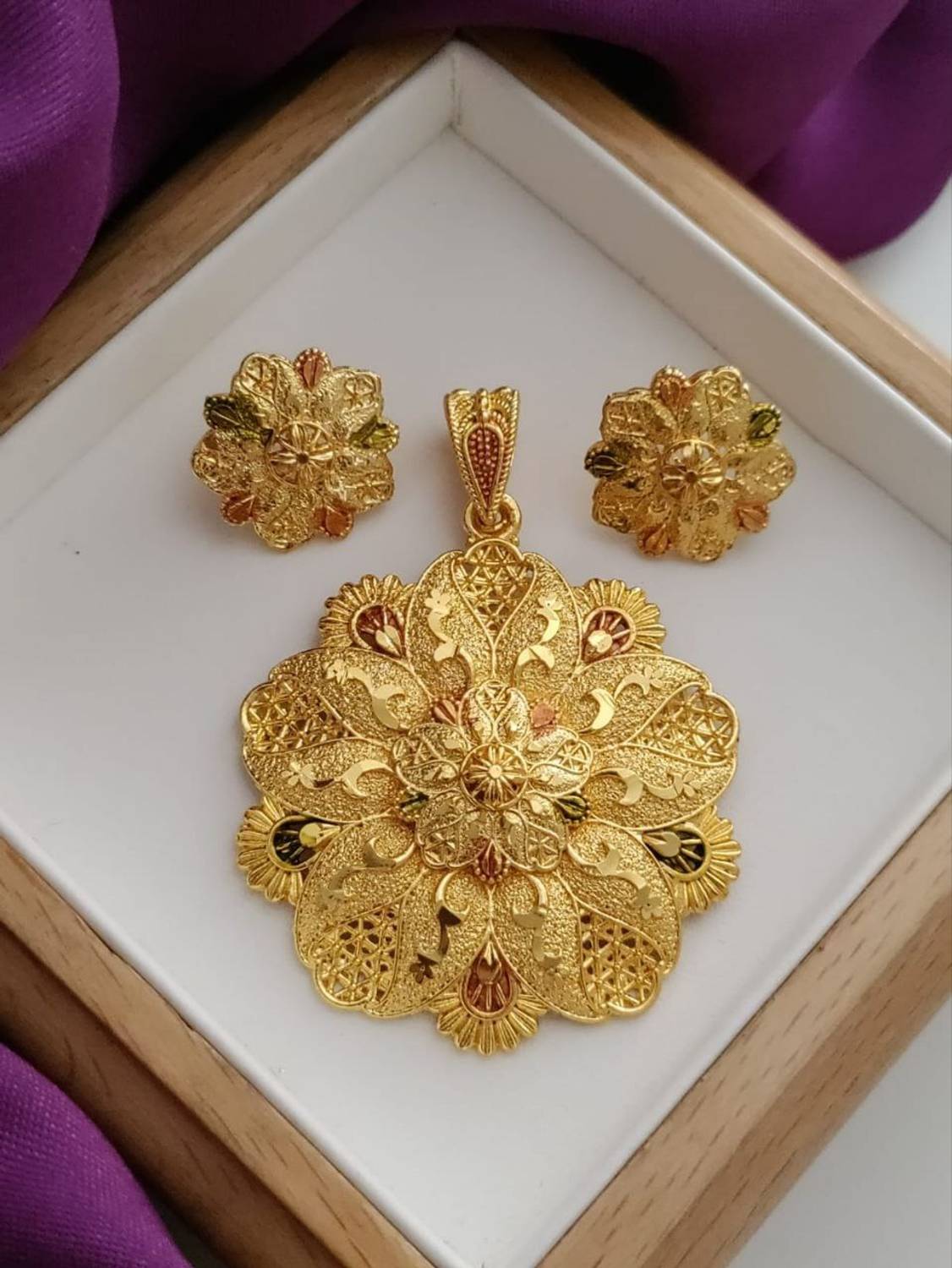 Bhagavati creation Bhagavati Gold-plated Brass Pendant Set