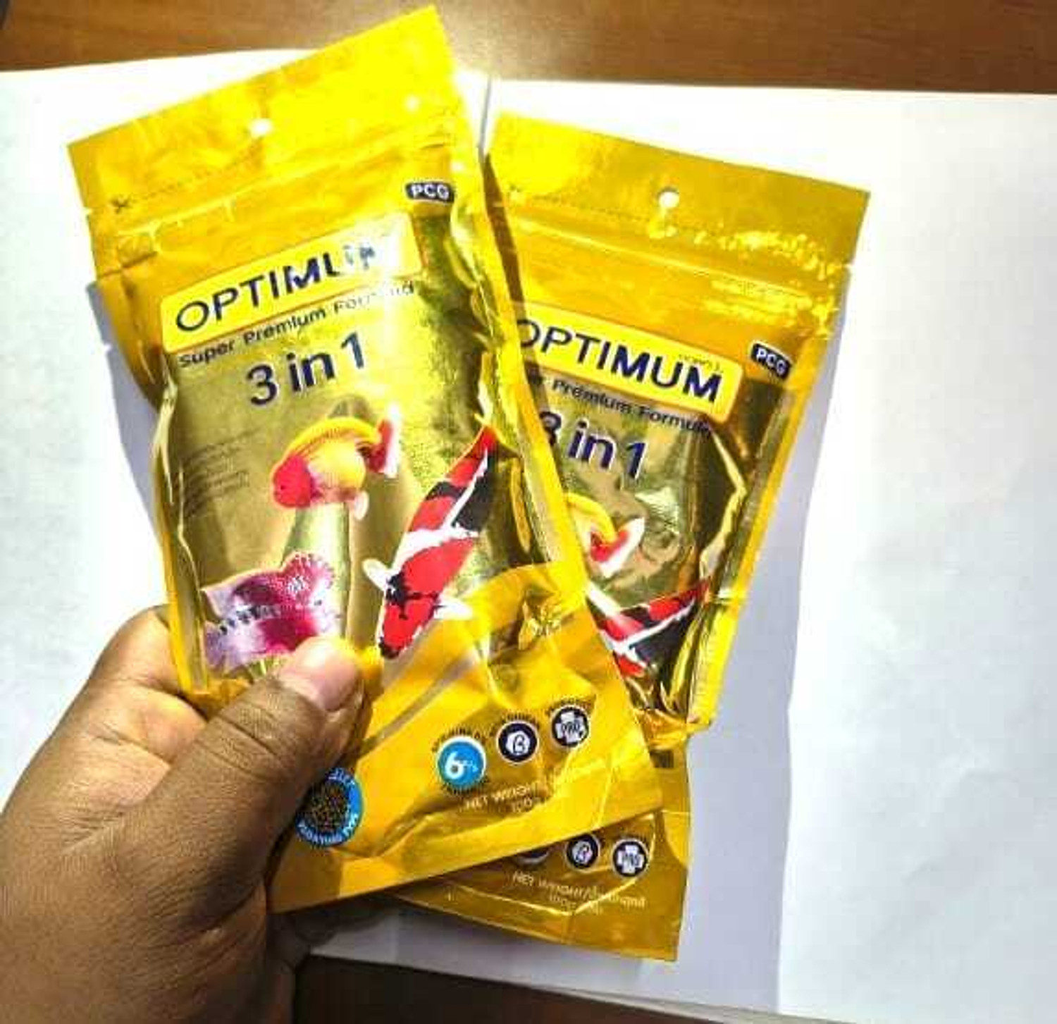 Image of OPTIMUM- OPTIMUM 3 IN 1 (100g)*2 Cod 0.2 kg (2x0.1 kg) Dry Adult Fish Food