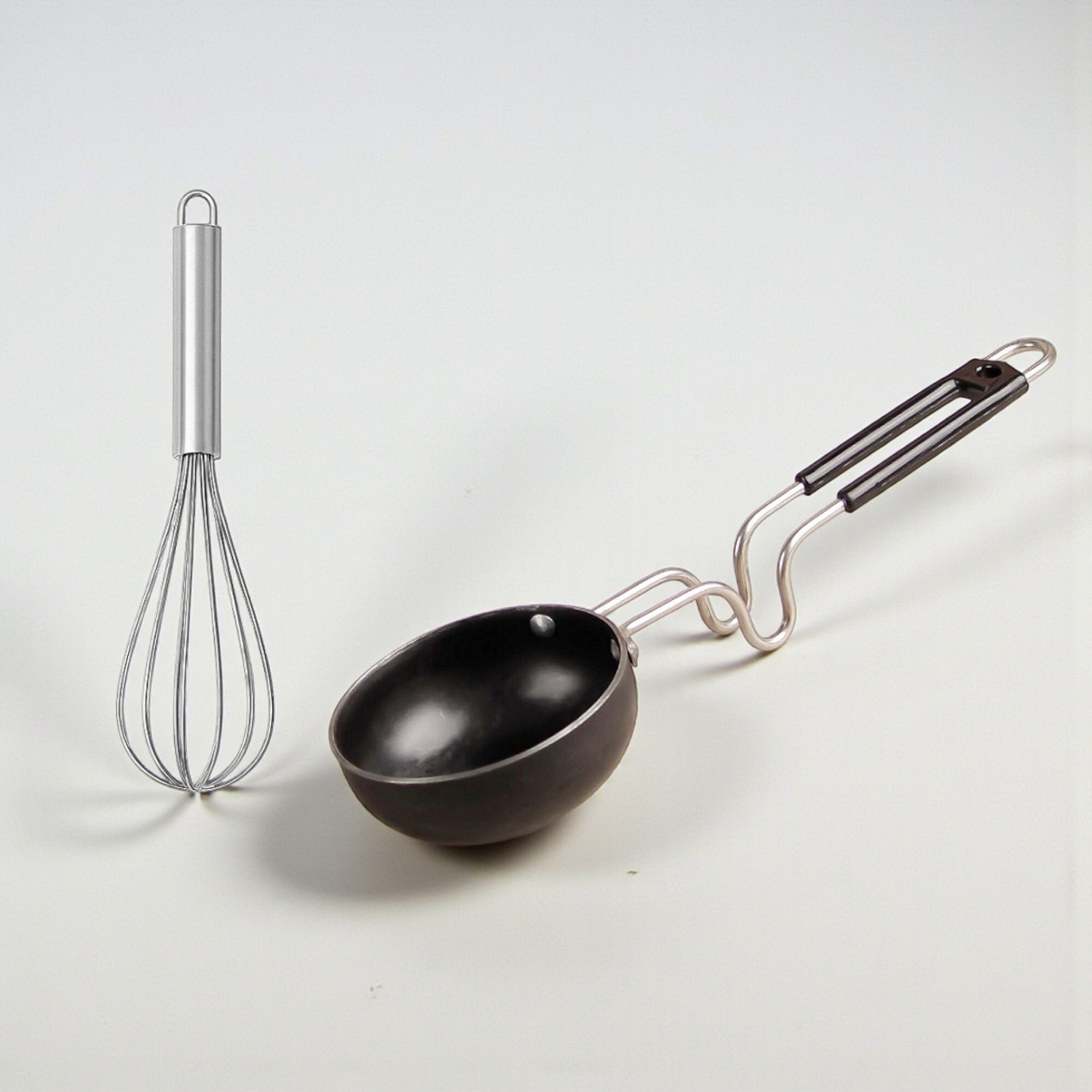Image of frogtail Heavy Base Iron tadka pan and whisk 25cm. Tadka Pan 12 cm diameter 0.4 L capacity