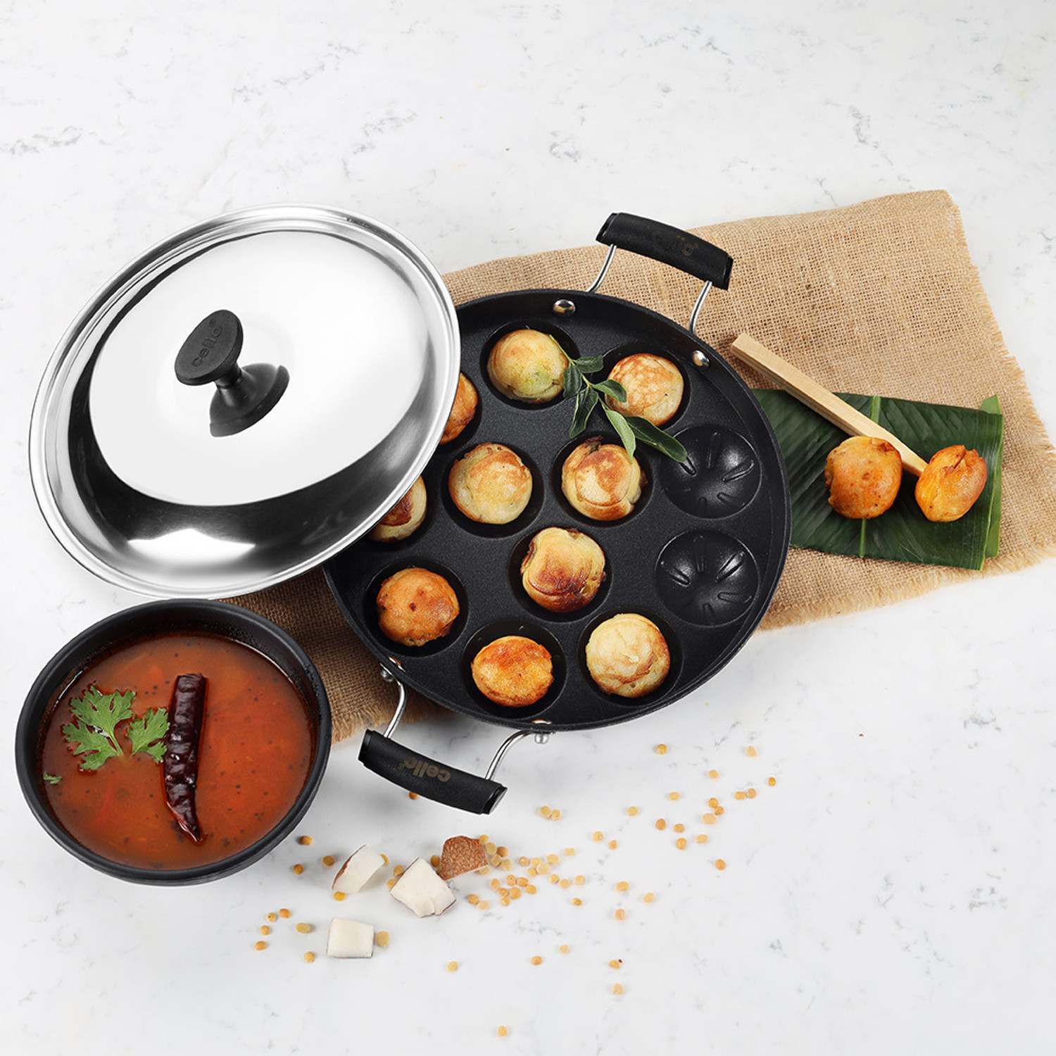 Image of cello 12 Cavity Grill Appam Patra Double Handle Paniarakkal Pan 25 cm diameter with Lid 1 L capacity