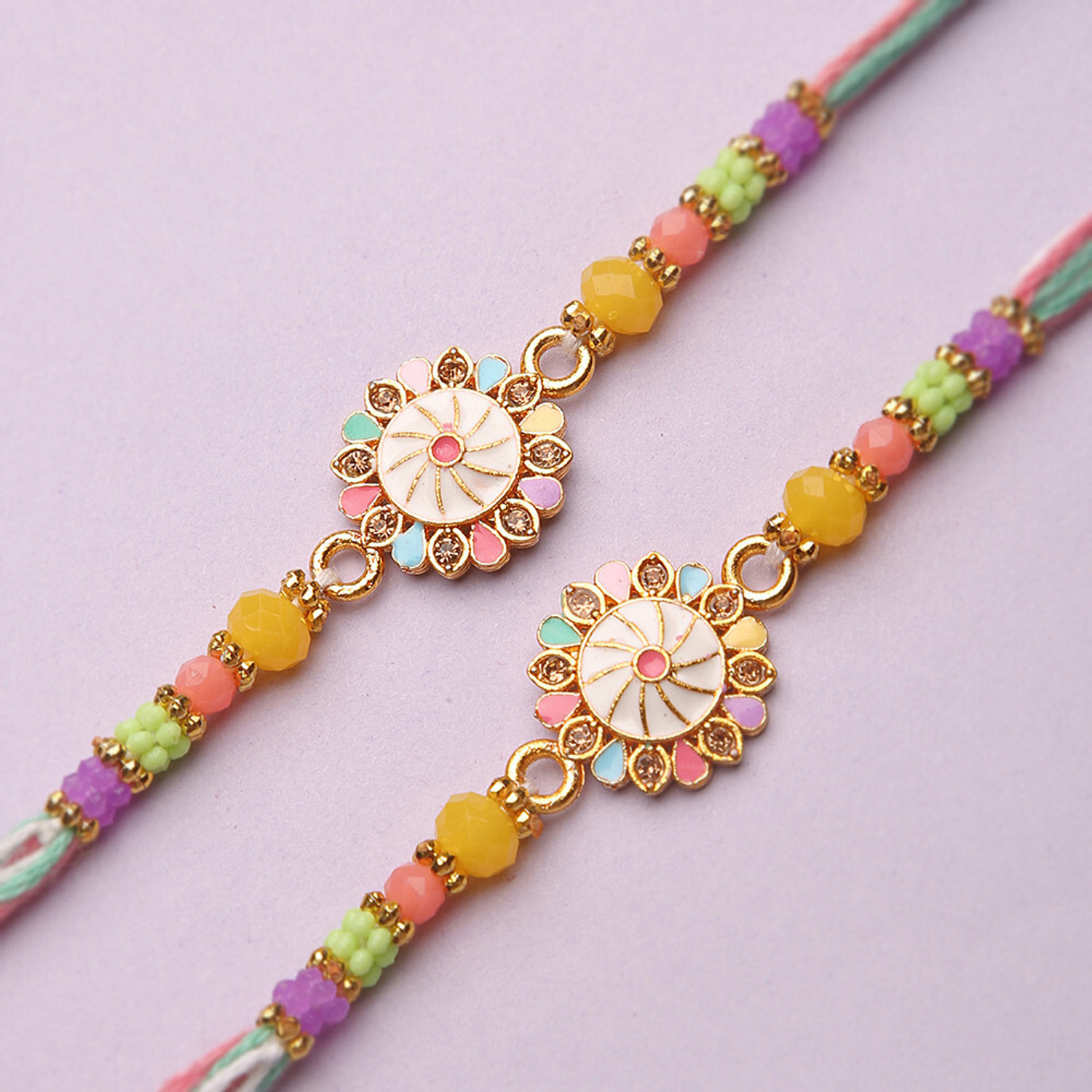 Image of Religious Multicolor Flower Rakhi for brother-D55 Mauli Thread Rakhi, Chawal Roli Pack Set by Local Charm