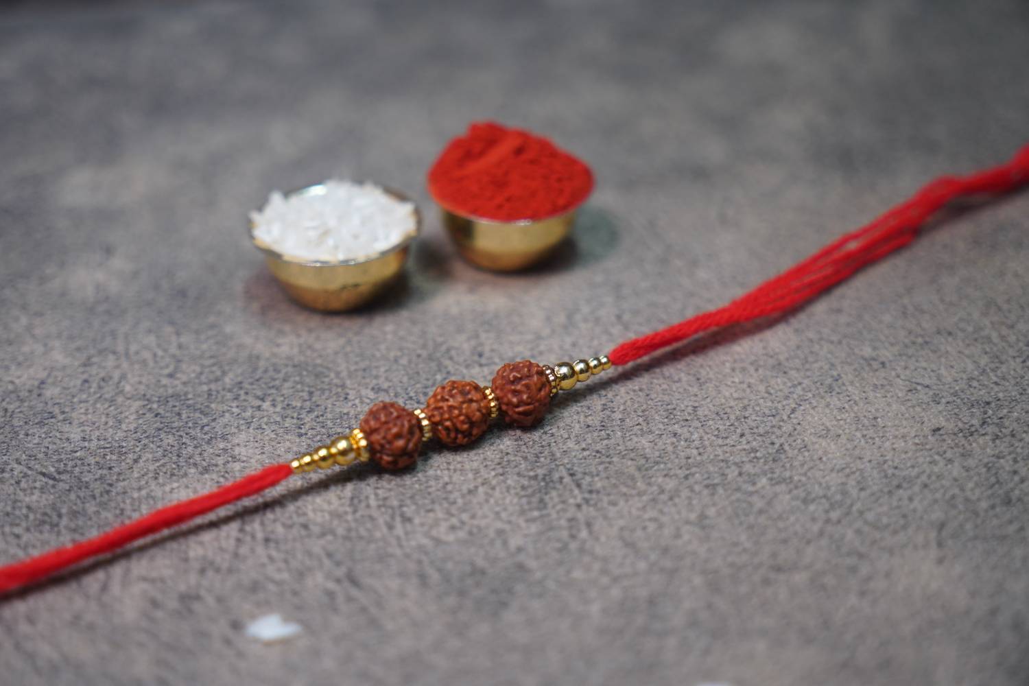 Rudraksh Rudraksha Rakhis with Roli Chawal Pearl Chawal Roli Pack Set by bhumiyaan