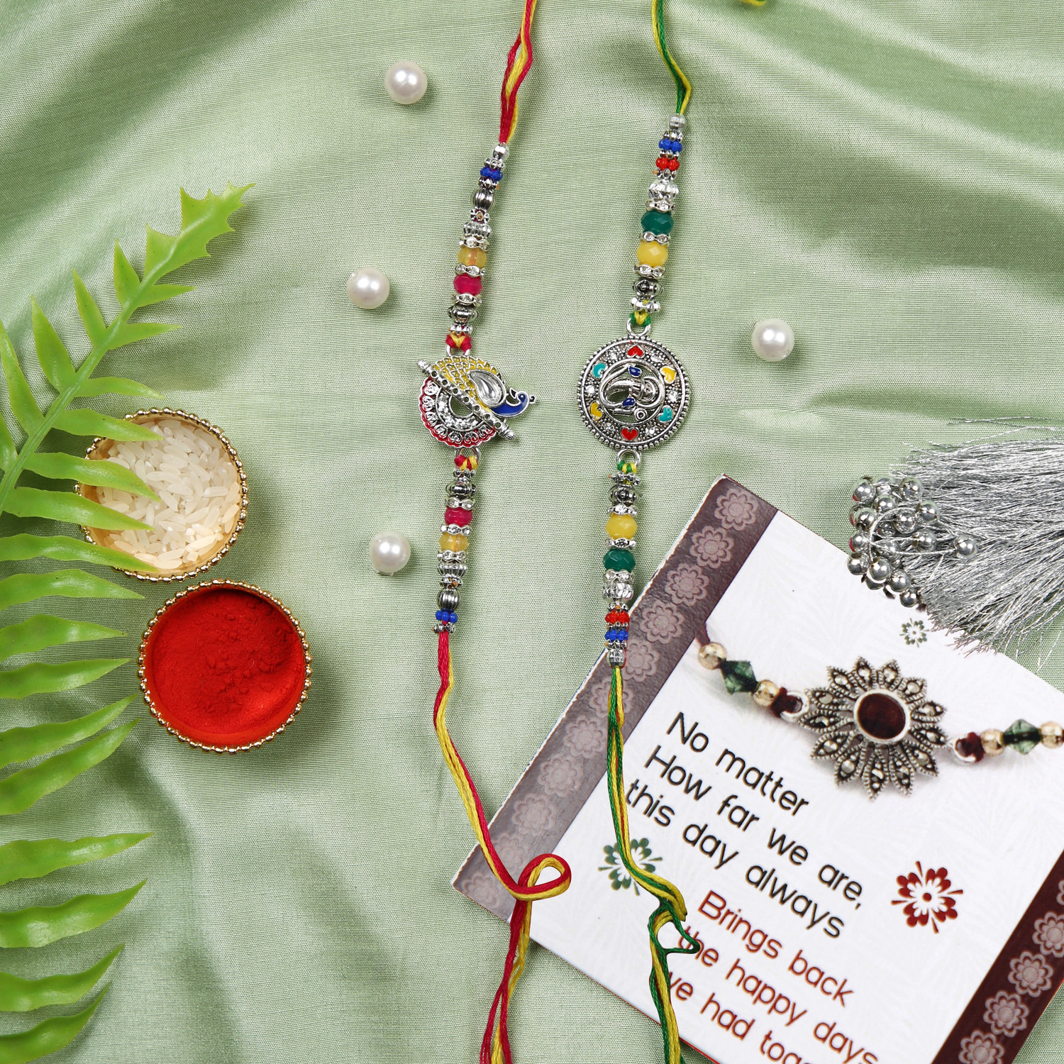 Image of Religious TR-RB23-Bro-Setof2Rakhi-NK006 Assorted Rakhi, Greeting Card, Chawal Roli Pack Set by TIED RIBBONS