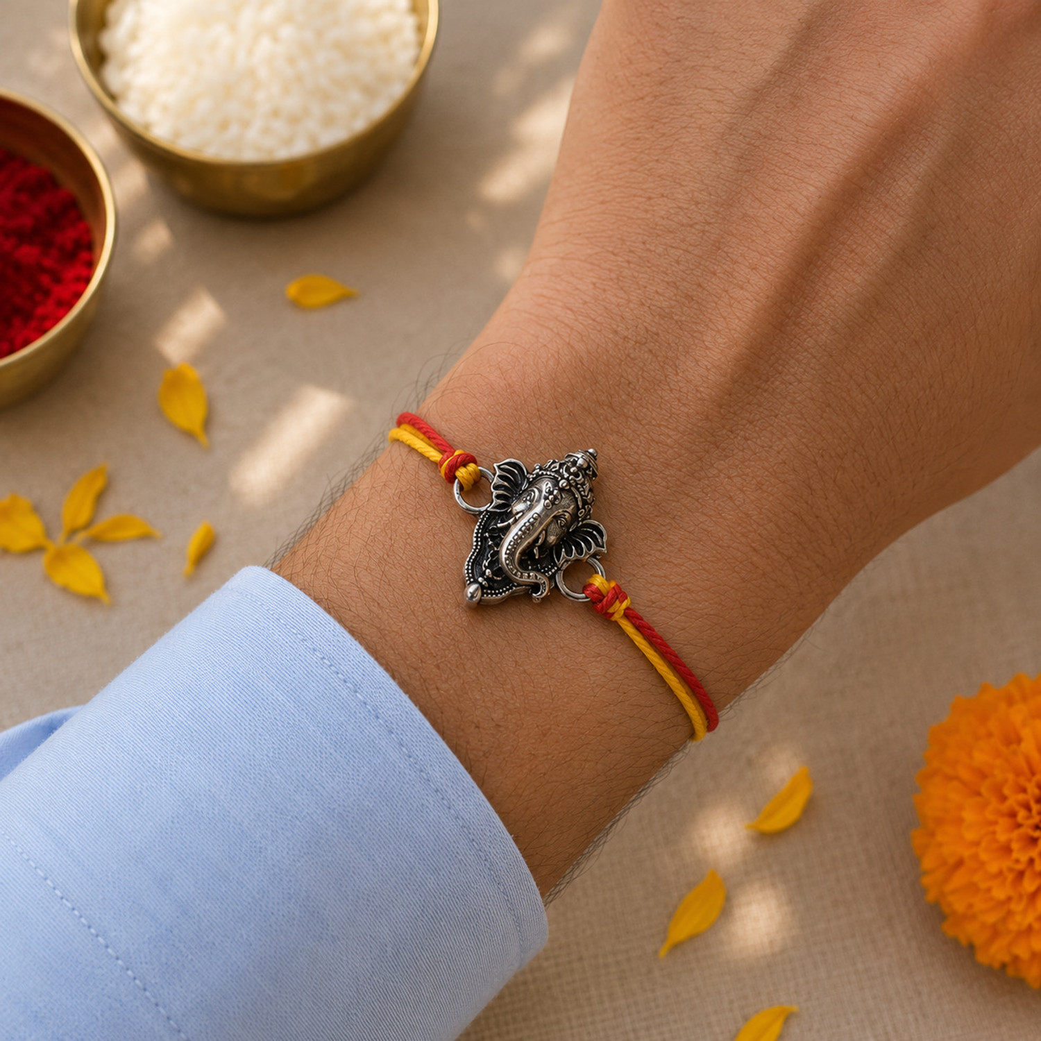 Image of Religious GAN-RAKHI-01 Mauli Thread Rakhi by Dakshis