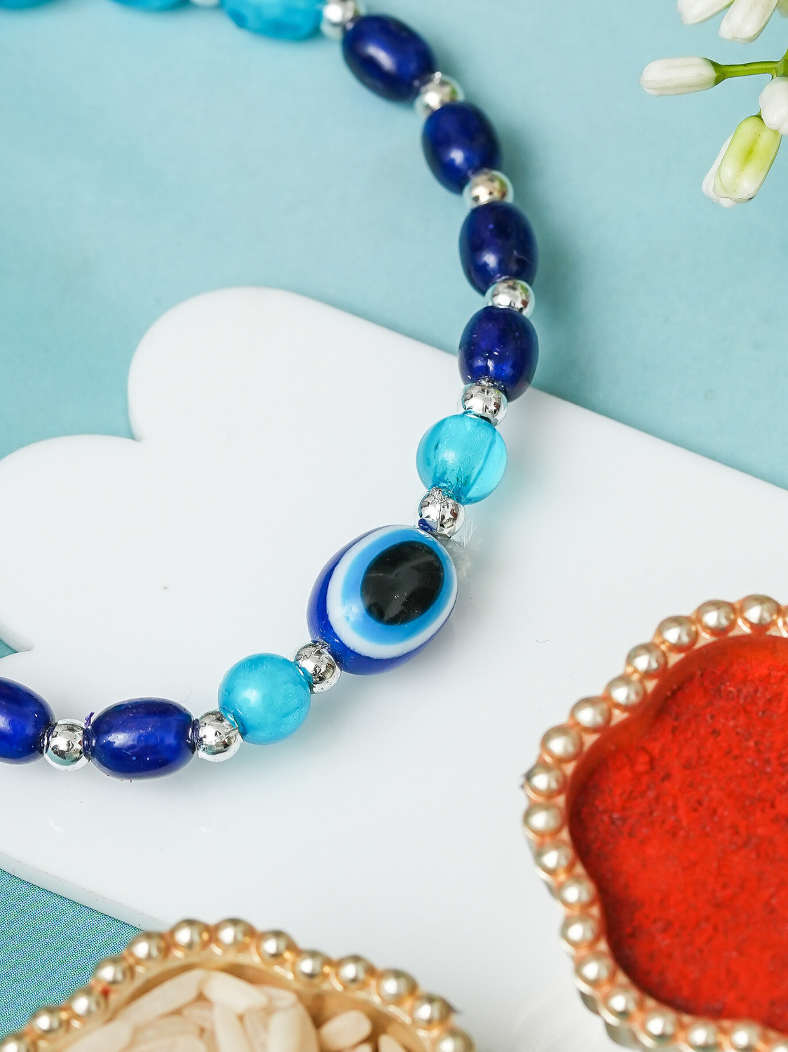 Image of Designer Rakhi For Brother Assorted Rakhi, Greeting Card, Chawal Roli Pack Set by Poorak