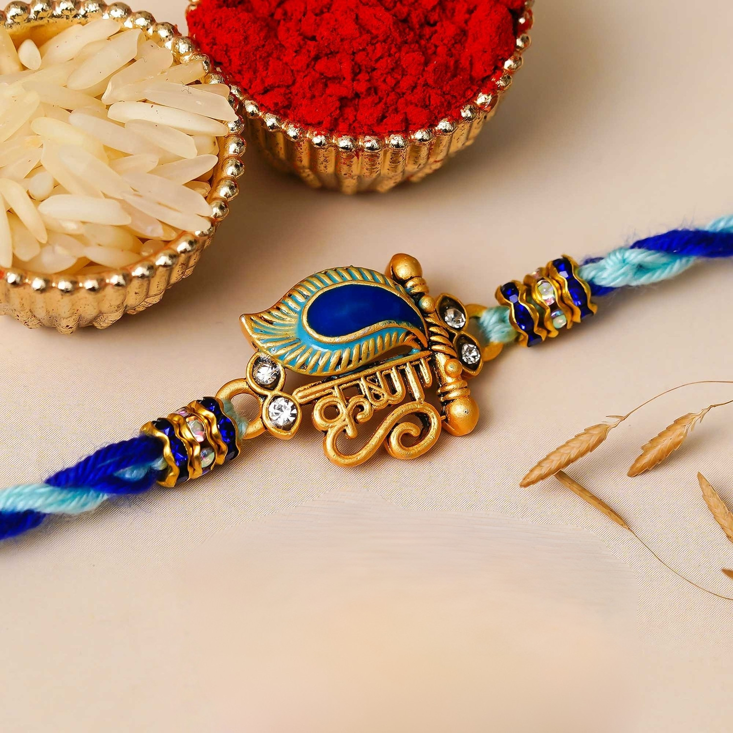 Image of Religious Rakhi Mirth Assorted Rakhi, Chawal Roli Pack Set by eCraftIndia