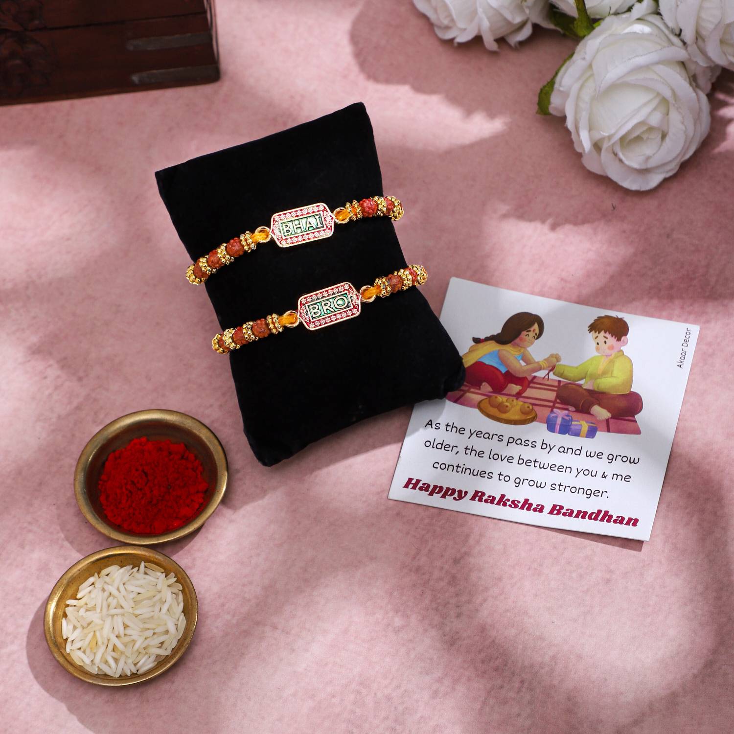 Religious Rakhi (Pack of 2) Bhai Bro| Roli Chawal | Card Gold Finish Greeting Card, Rakhi Set by Akaar