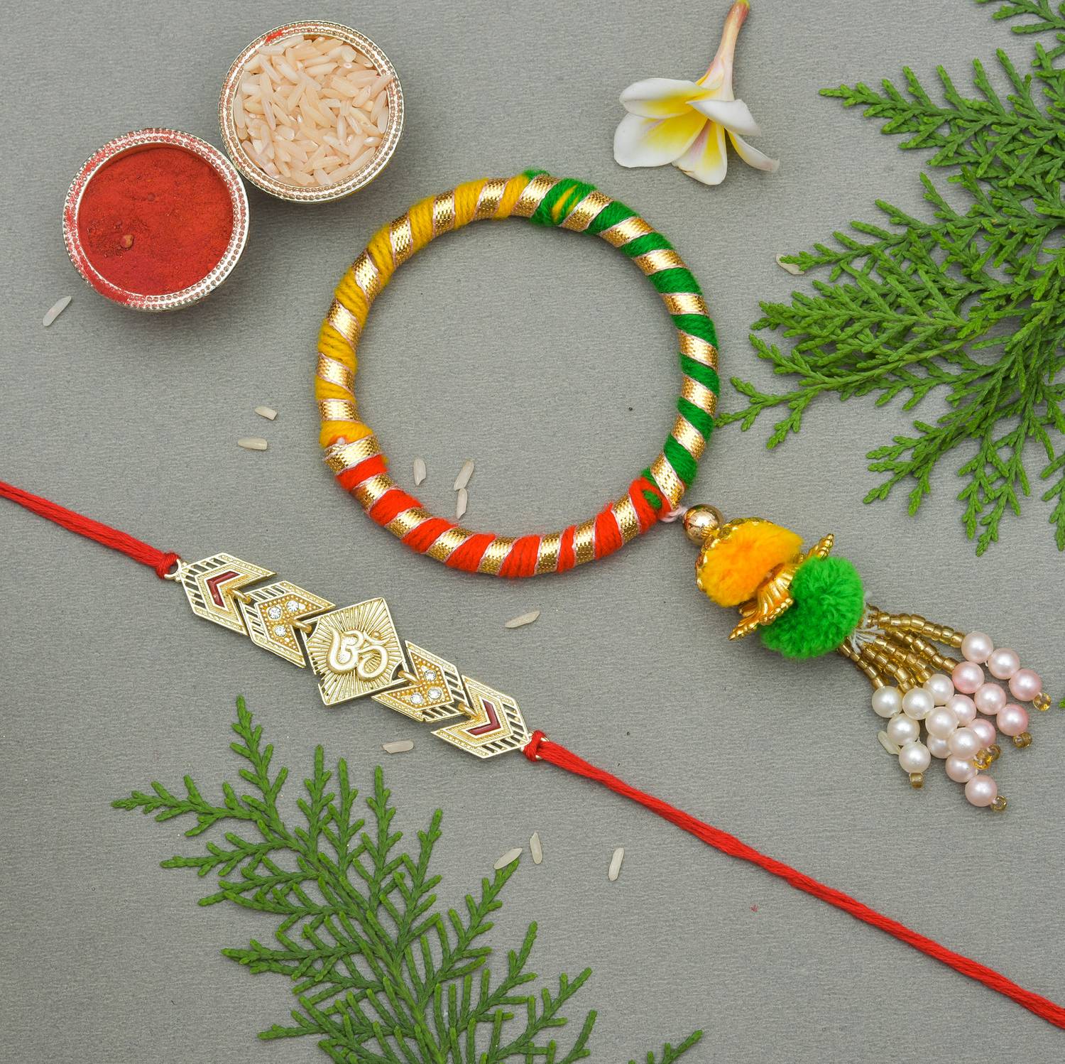 Bhaiya Bhabhi Rakhi for Brother and Bhabhi pair, OM rakhi for bhai, with Roli Chawal Mauli Thread Rakhi, Chawal Roli Pack, Greeting Card Set by arvind's