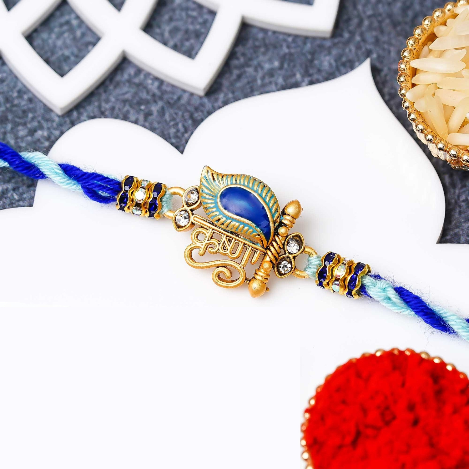 Image of Religious Rakhi Mirth Assorted Rakhi, Chawal Roli Pack Set by eCraftIndia
