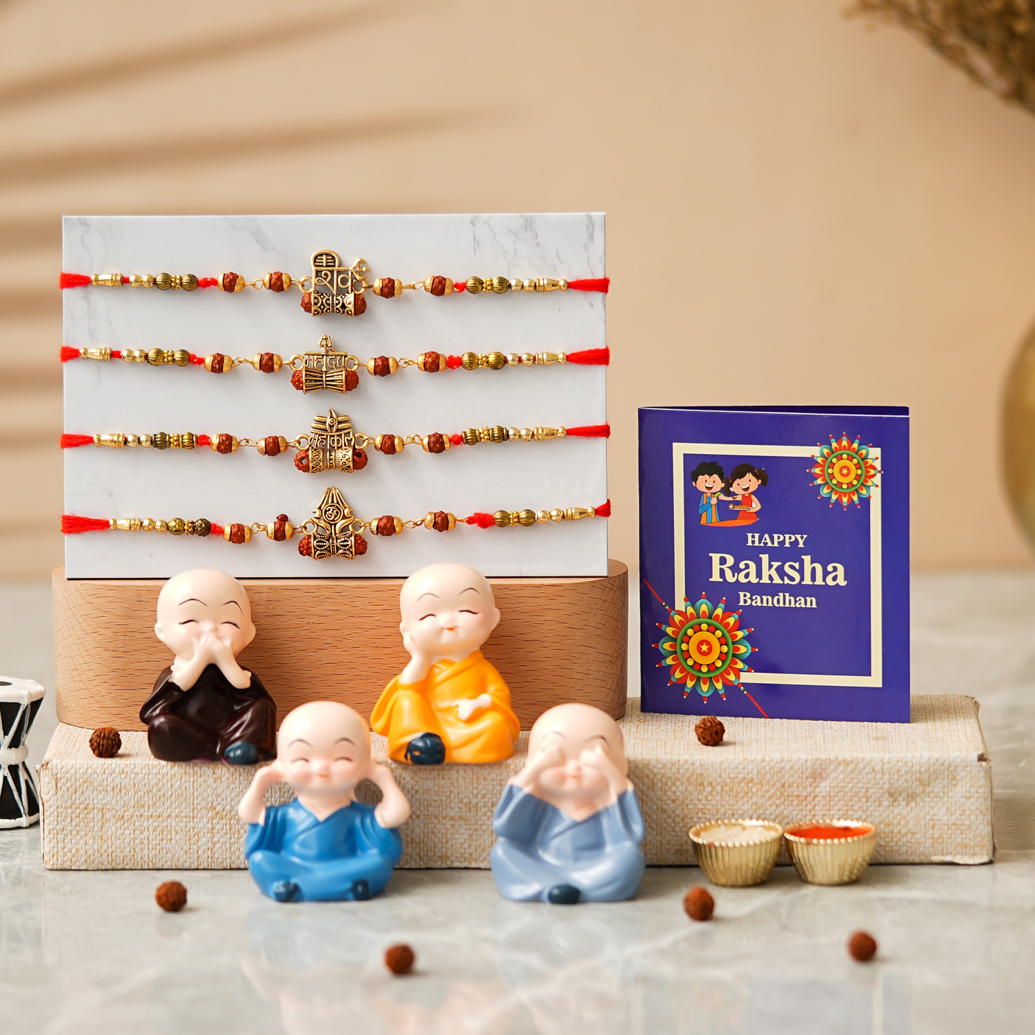 Image of Rudraksh 4 Monk Buddha With Beautiful 4 Rakhi Set Assorted Rakhi, Chawal Roli Pack, Greeting Card Set by PRIDE STORE