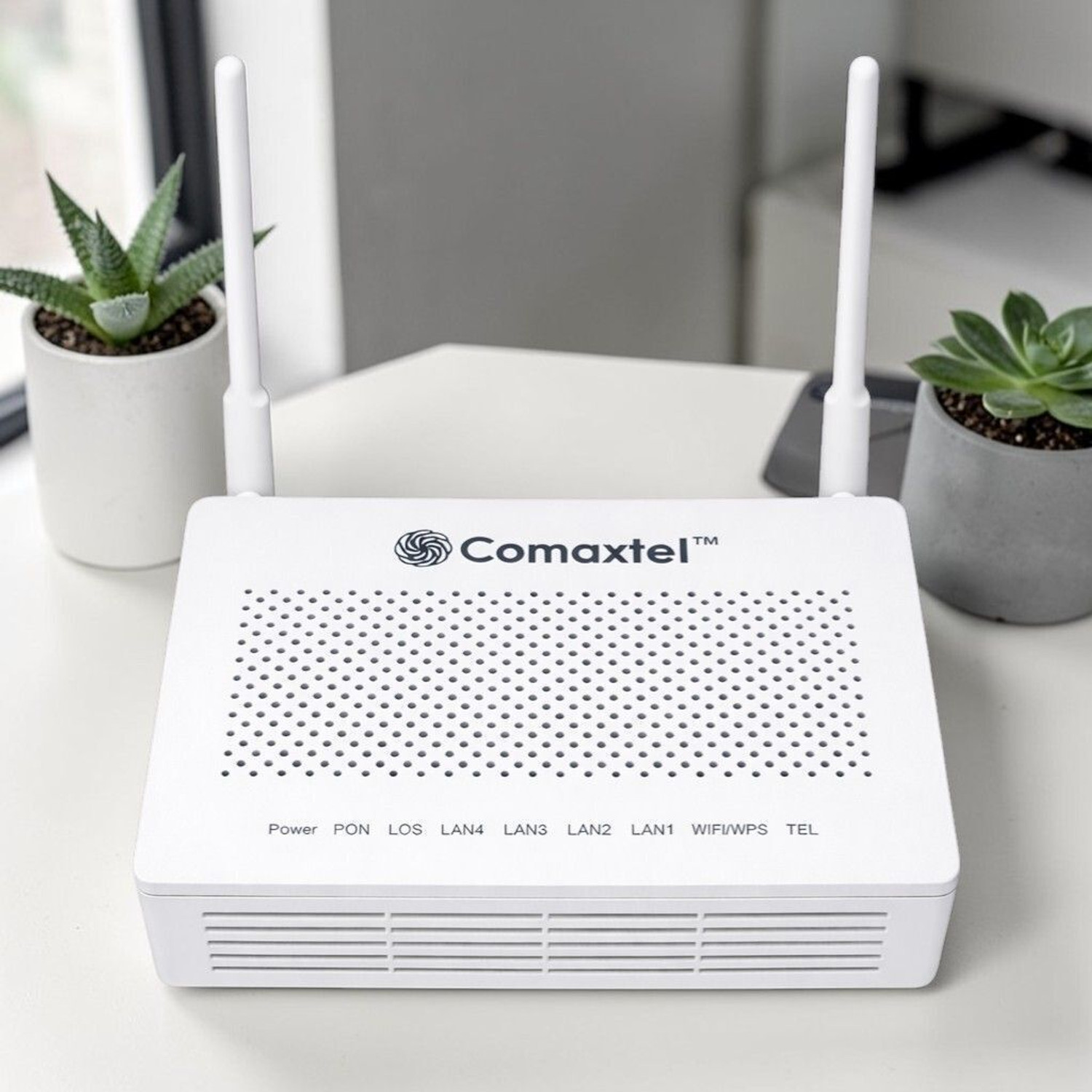 Image of COMAXTEL QUANTUM-S02 Single Band XPON ONT /Wireless Fiber Router, 1 VoIP Port, 1GE+2FE+USB Wireless Router 2.4 GHz 300 Mbps Wifi Speed Single Band External Antenna Ethernet (Cable Broadband)