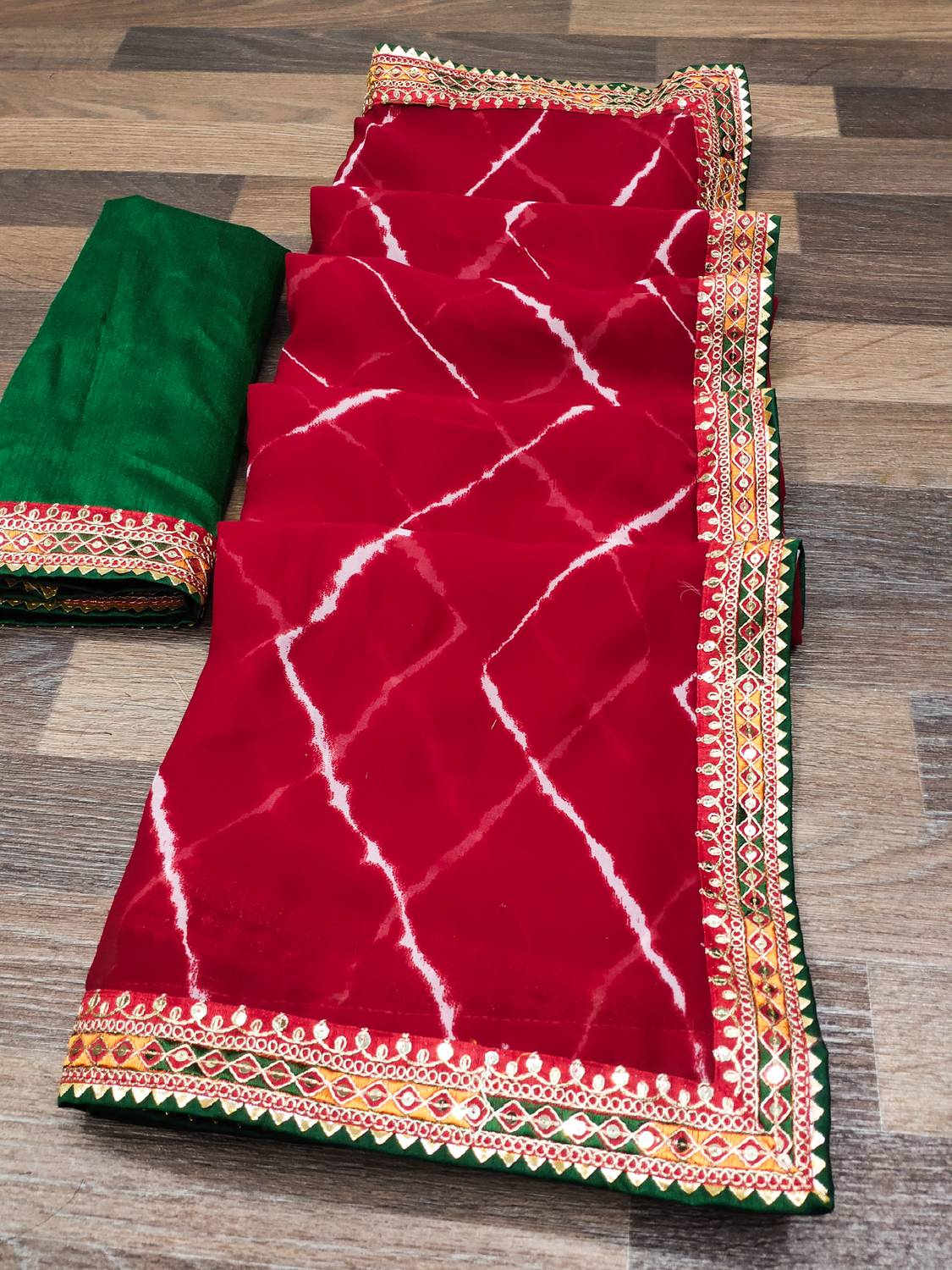 ASTEYAM Printed Leheria Georgette Saree