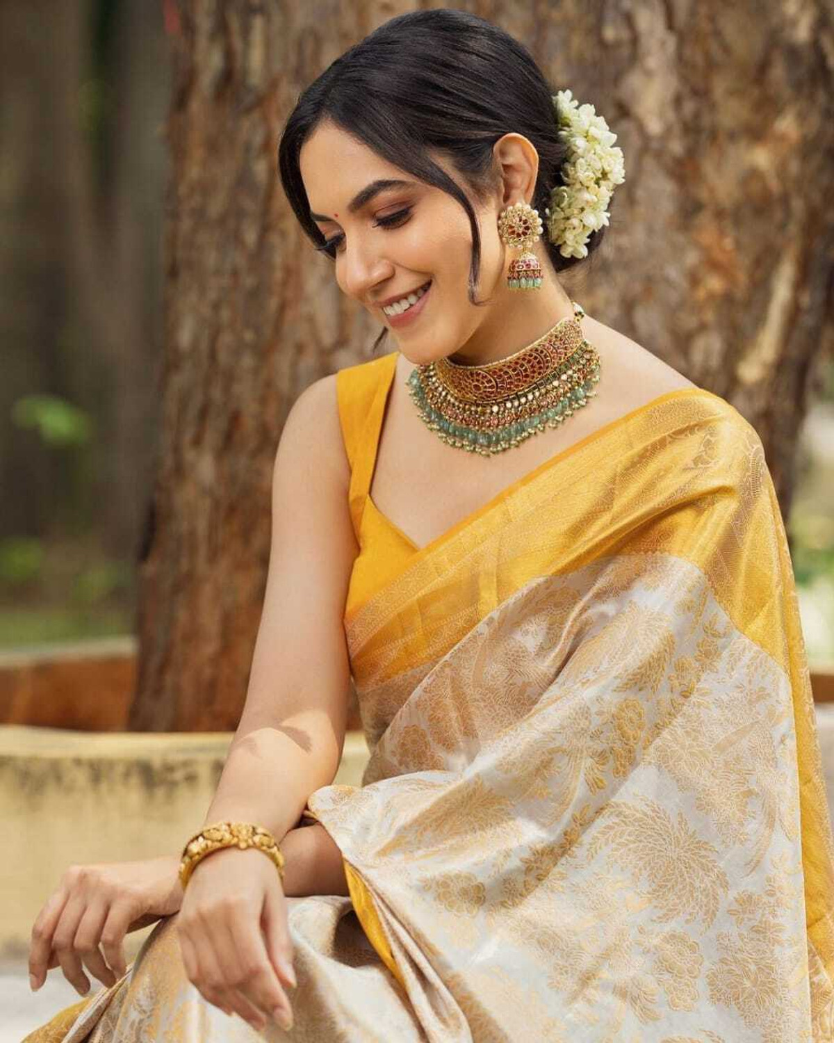 Image of WOMENELEGENCE Embellished Banarasi Pure Silk Saree