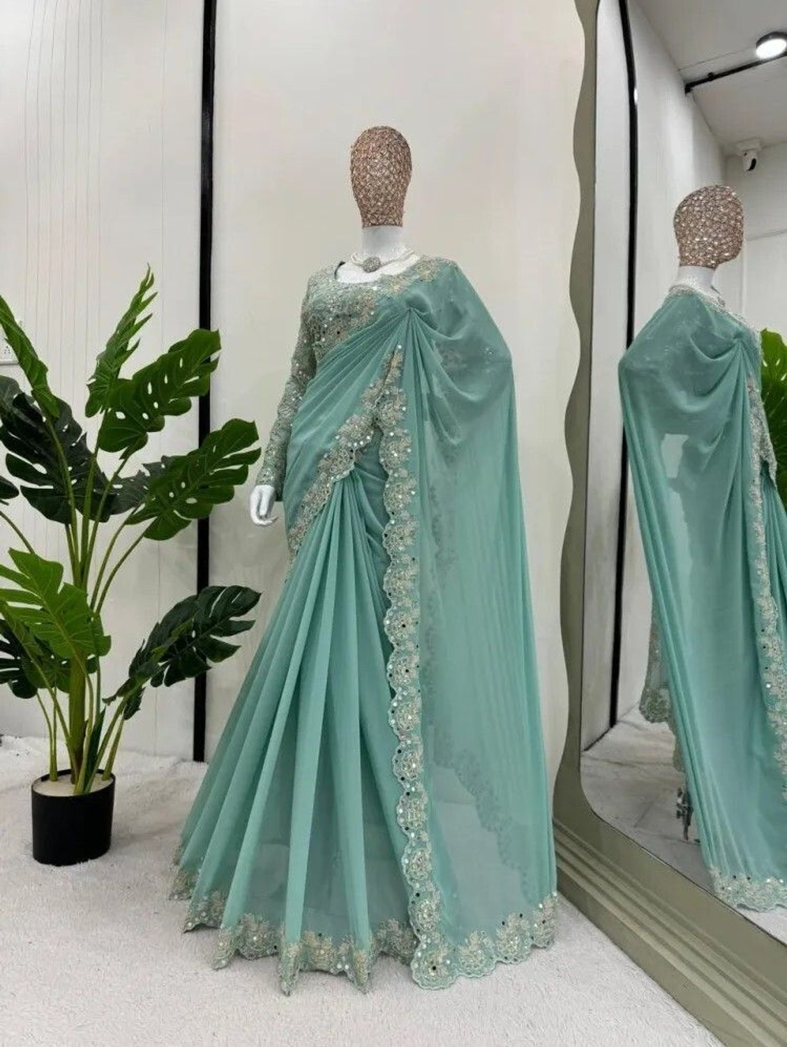 Image of Brahmani Creation Embroidered Bollywood Georgette Saree