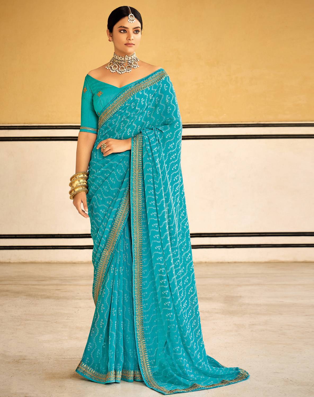Siril Striped, Embellished Bandhani Georgette Saree (Light Blue)