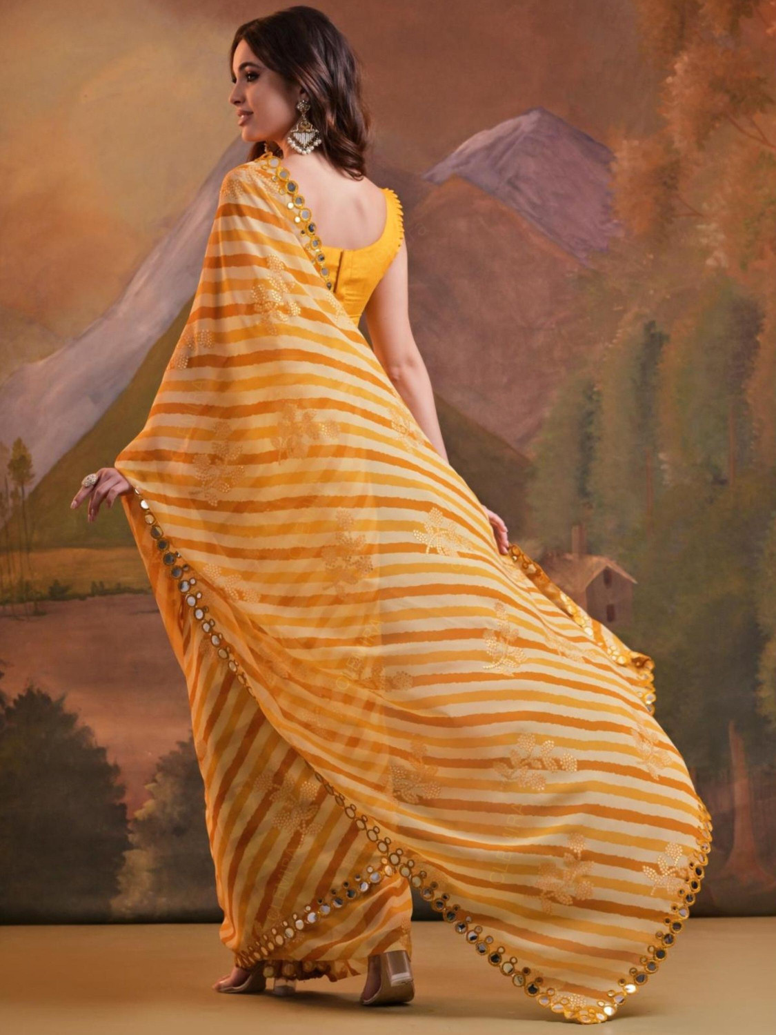 Image of Clemira Striped Bollywood Georgette Saree