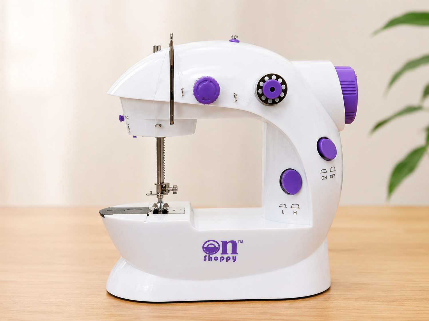 Image of Onshoppy Mini Portable Sewing Machine with Dual Thread and Two Speeds for Home & Travel Electric Sewing Machine 1 built-in stitches 200 SPM White