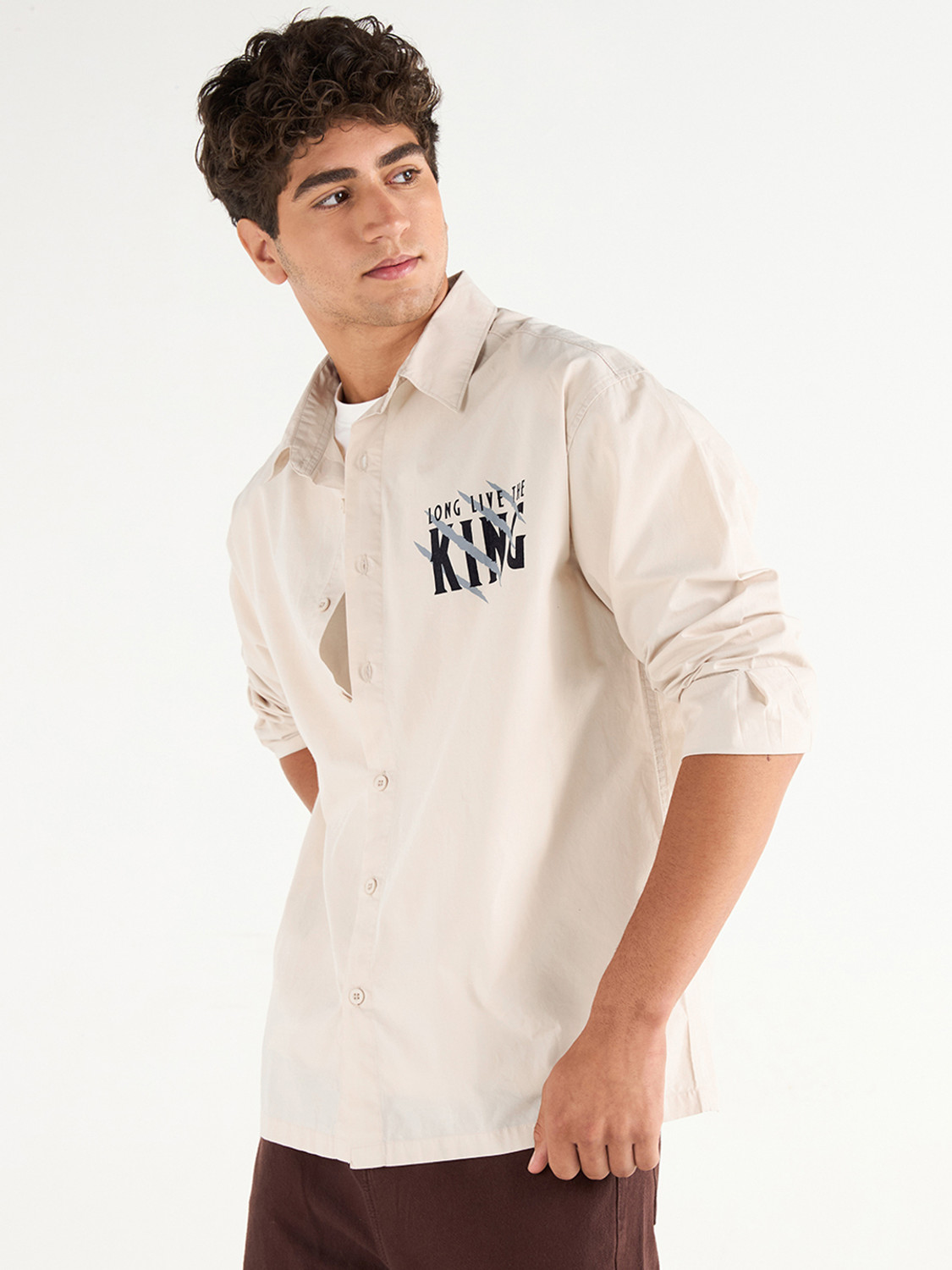 Image of BEWAKOOF Men Graphic Print Casual Beige Shirt