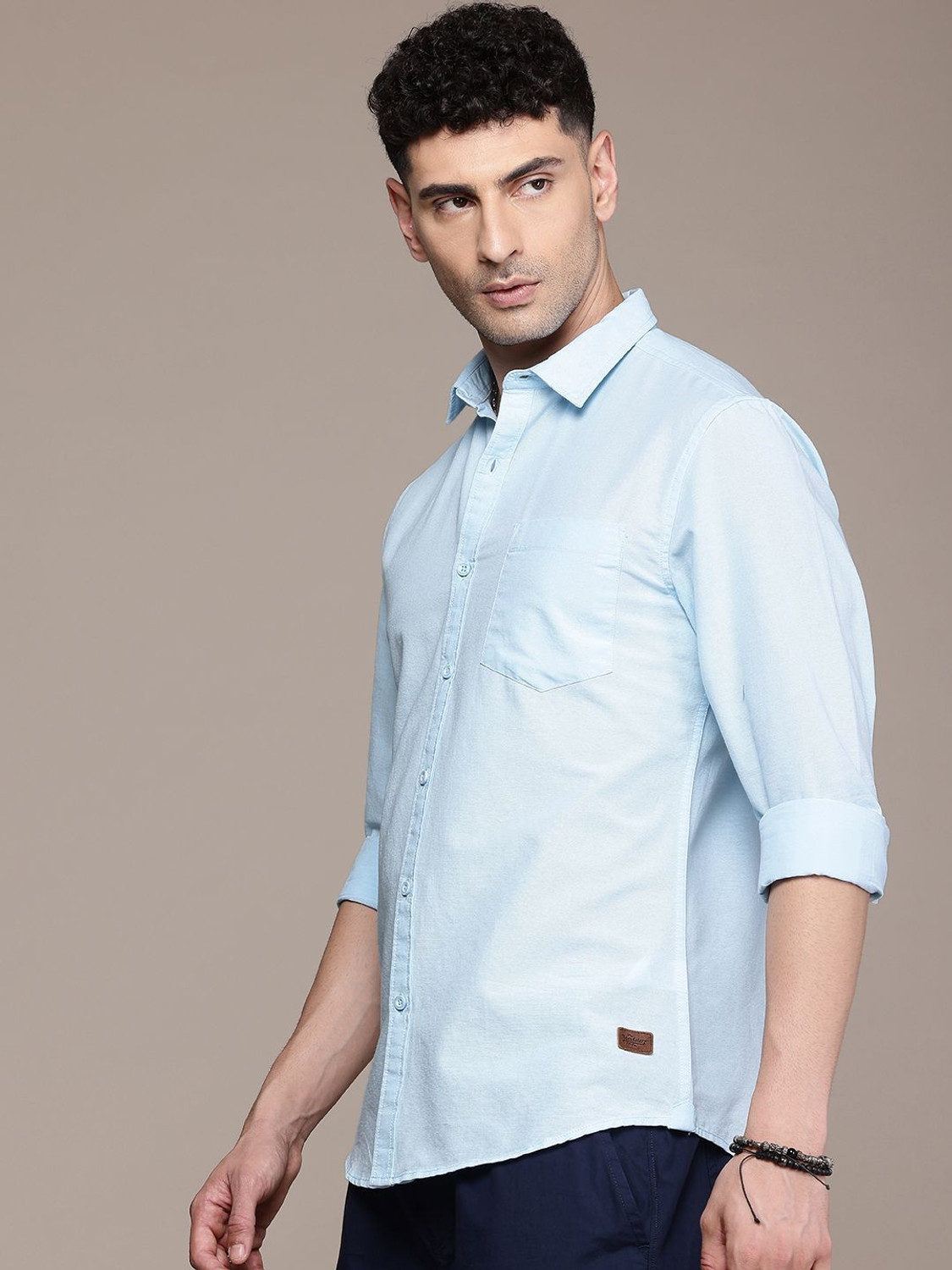 Image of Roadster Men Solid Casual Blue Shirt