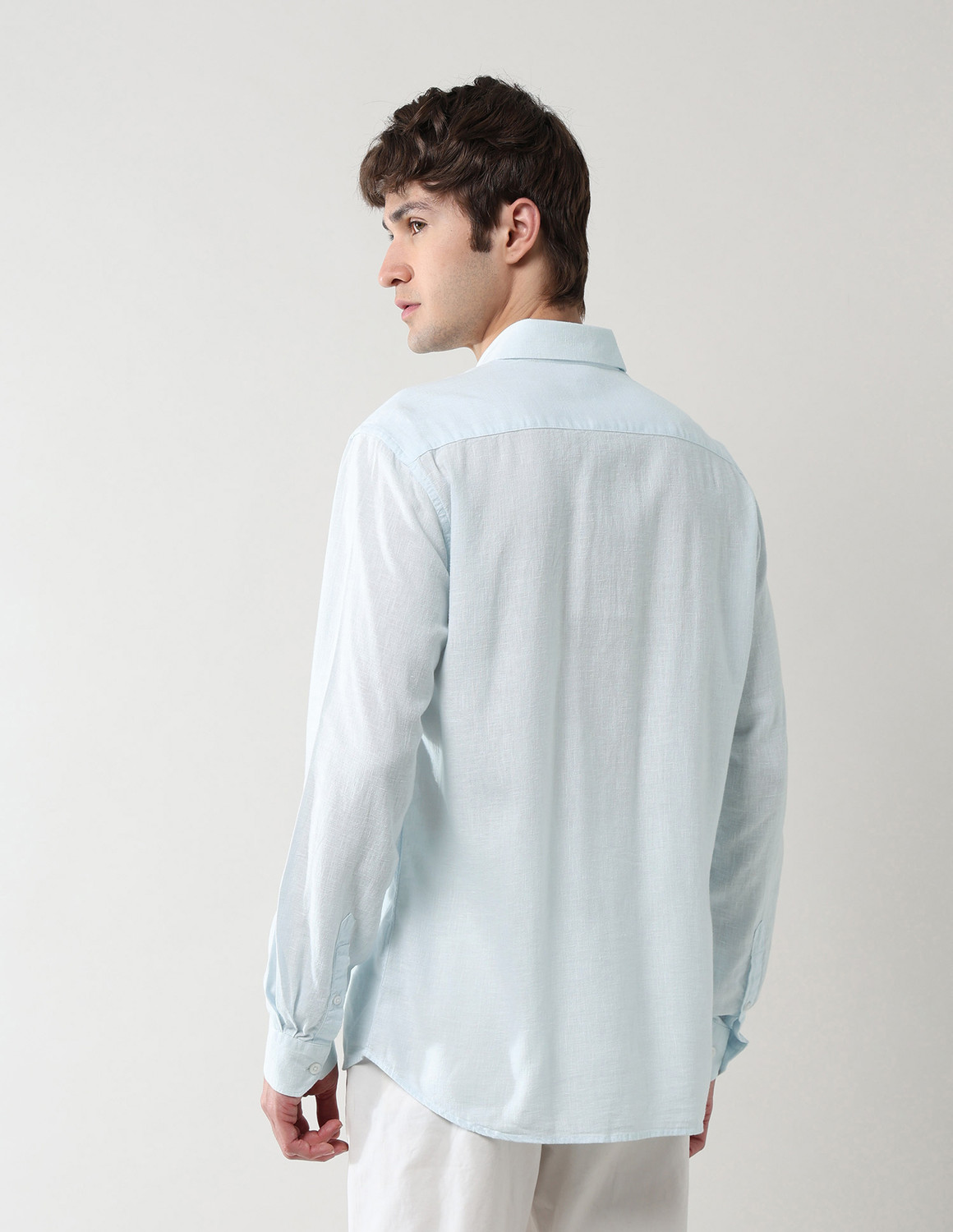 Image of Arrow Sport Men Slim Fit Solid Spread Collar Casual Shirt