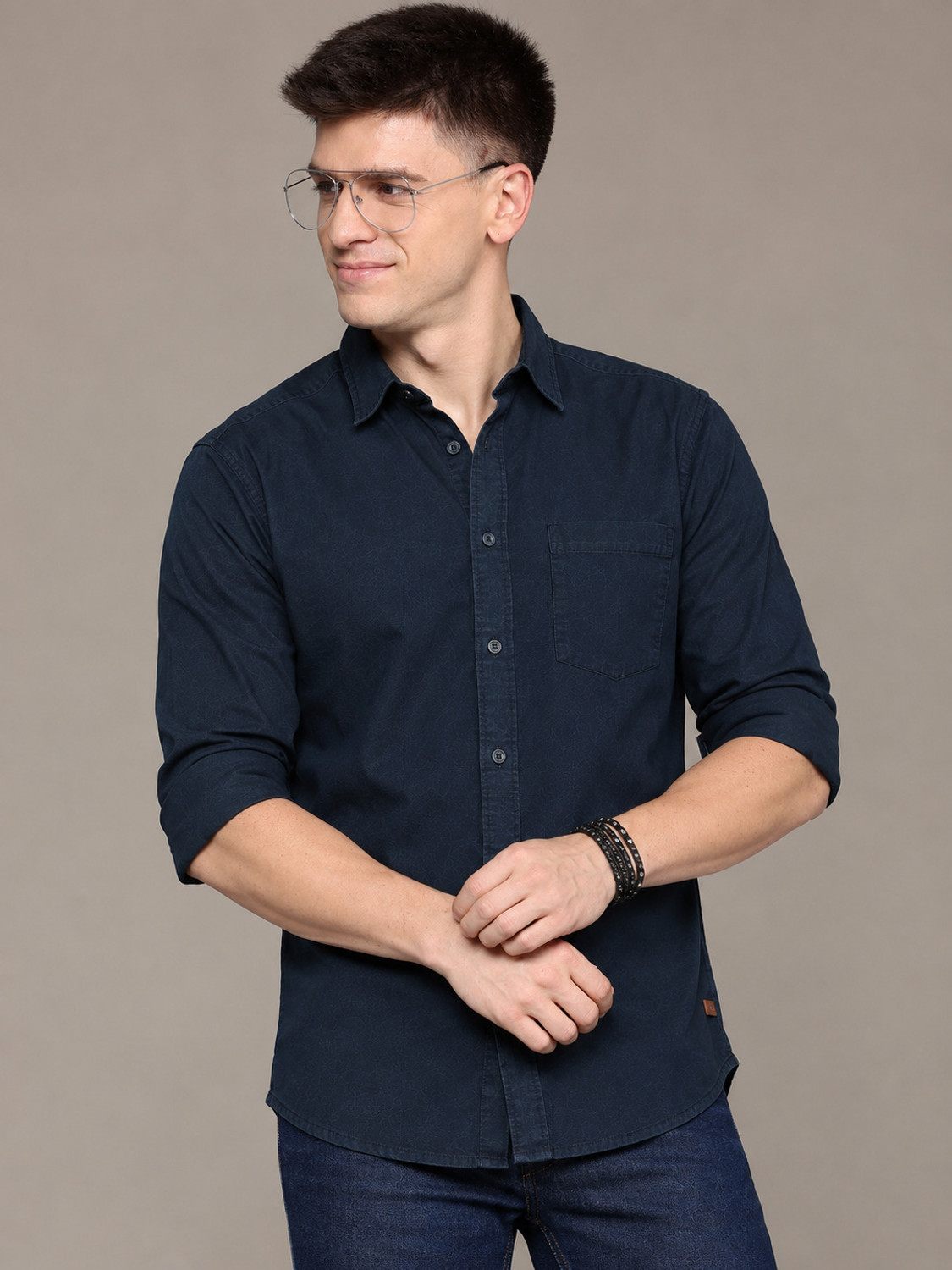 Image of Roadster Men Regular Fit Solid Spread Collar Casual Shirt