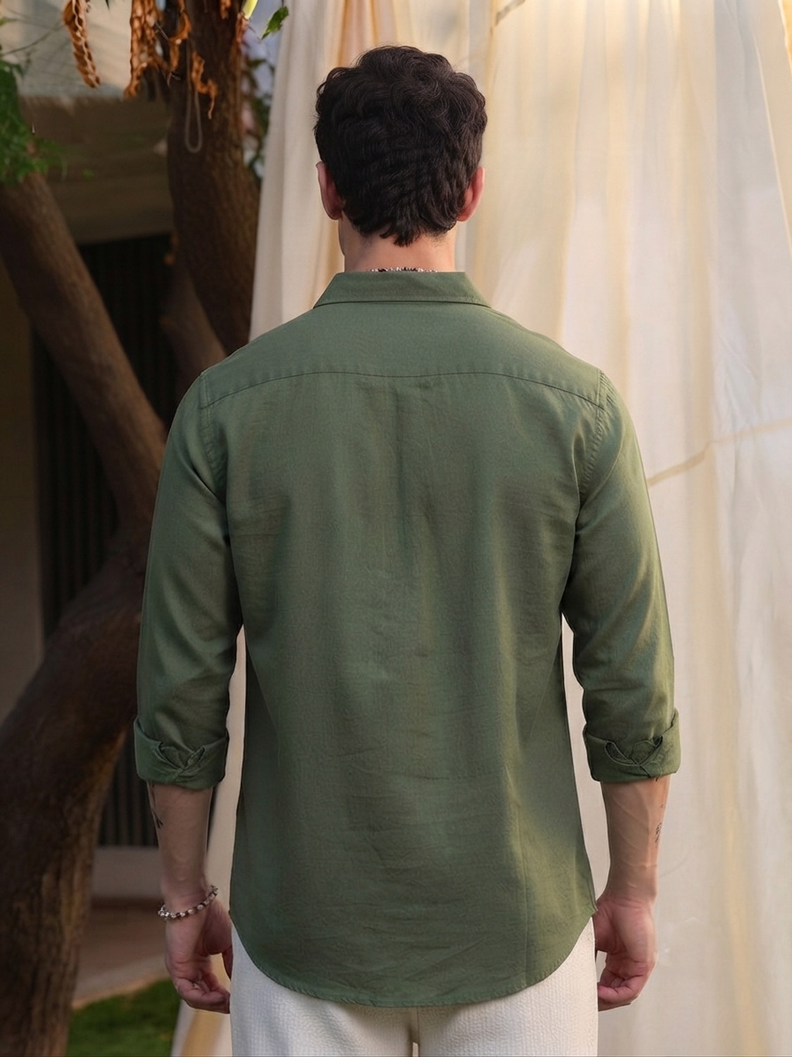 Image of Roadster Men Solid Casual Dark Green Shirt