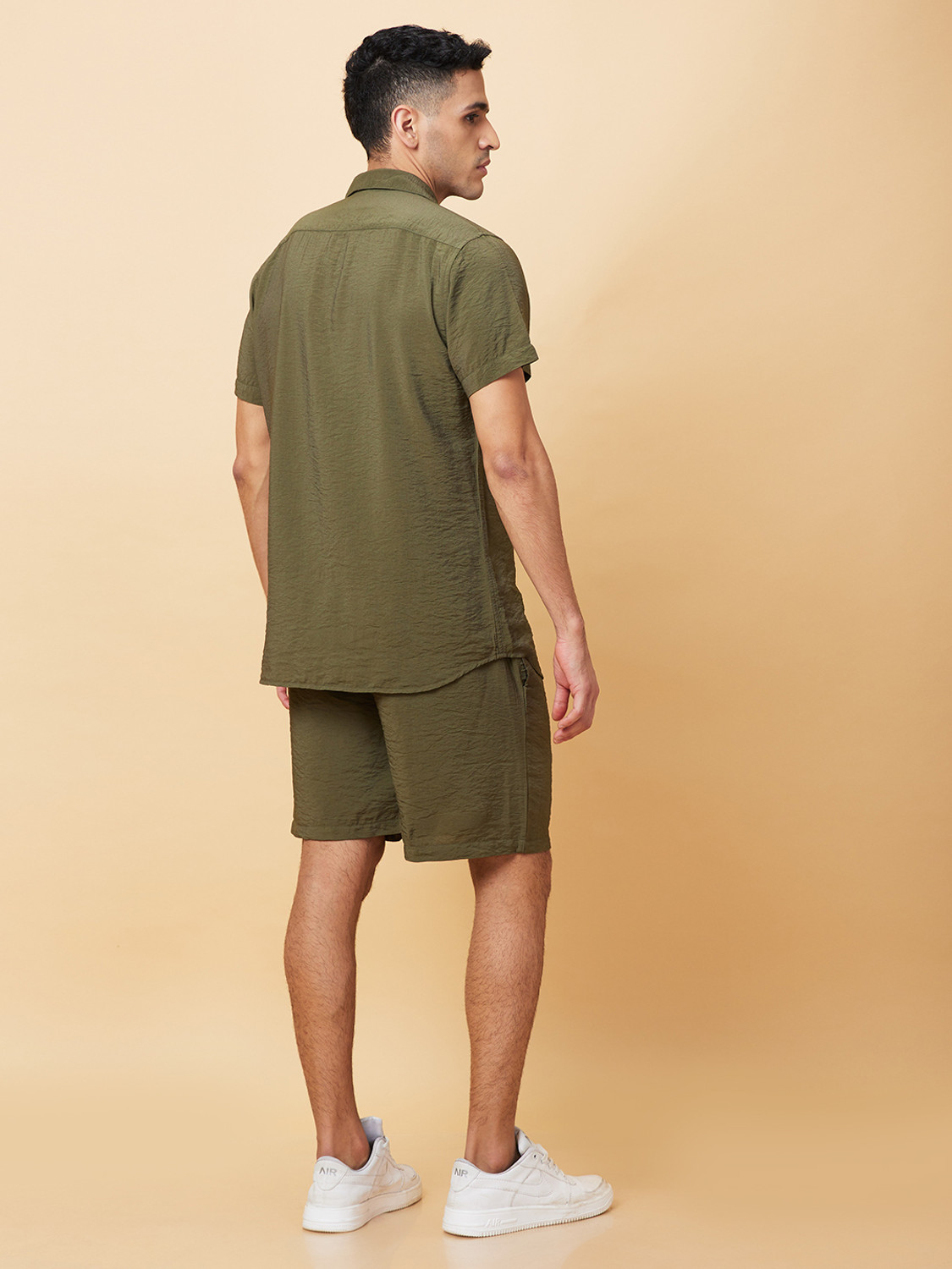 Image of BEING HUMAN Men Solid Casual Dark Green Shirt