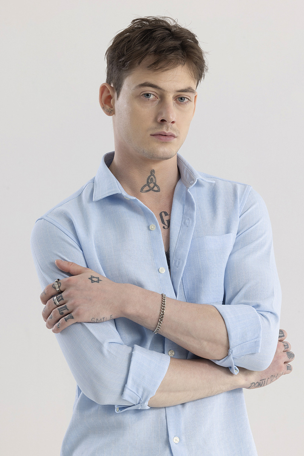 Image of Snitch Men Solid Casual Light Blue Shirt