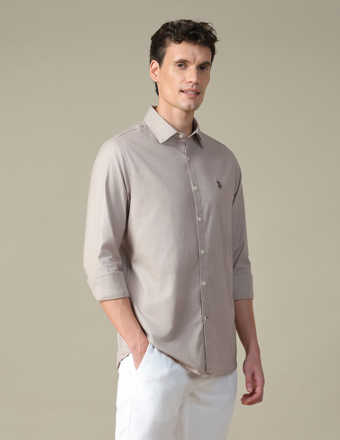 Image of U.S. POLO ASSN. Men Tailored Fit Solid Spread Collar Casual Shirt