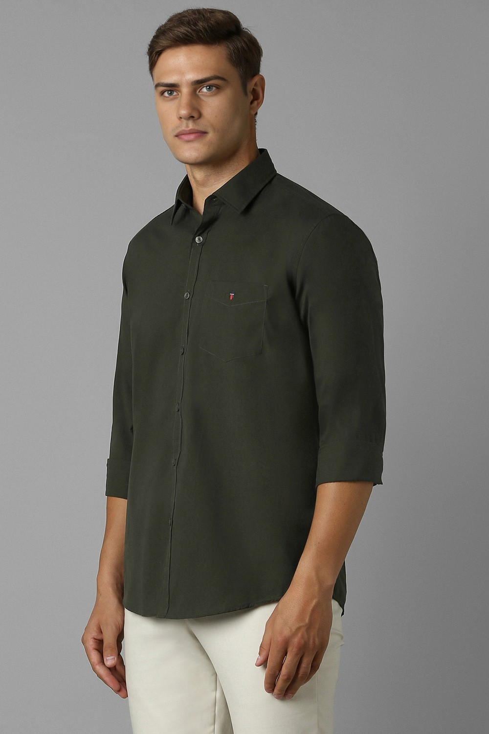 Image of Louis Philippe Sport Men Solid Casual Dark Green Shirt