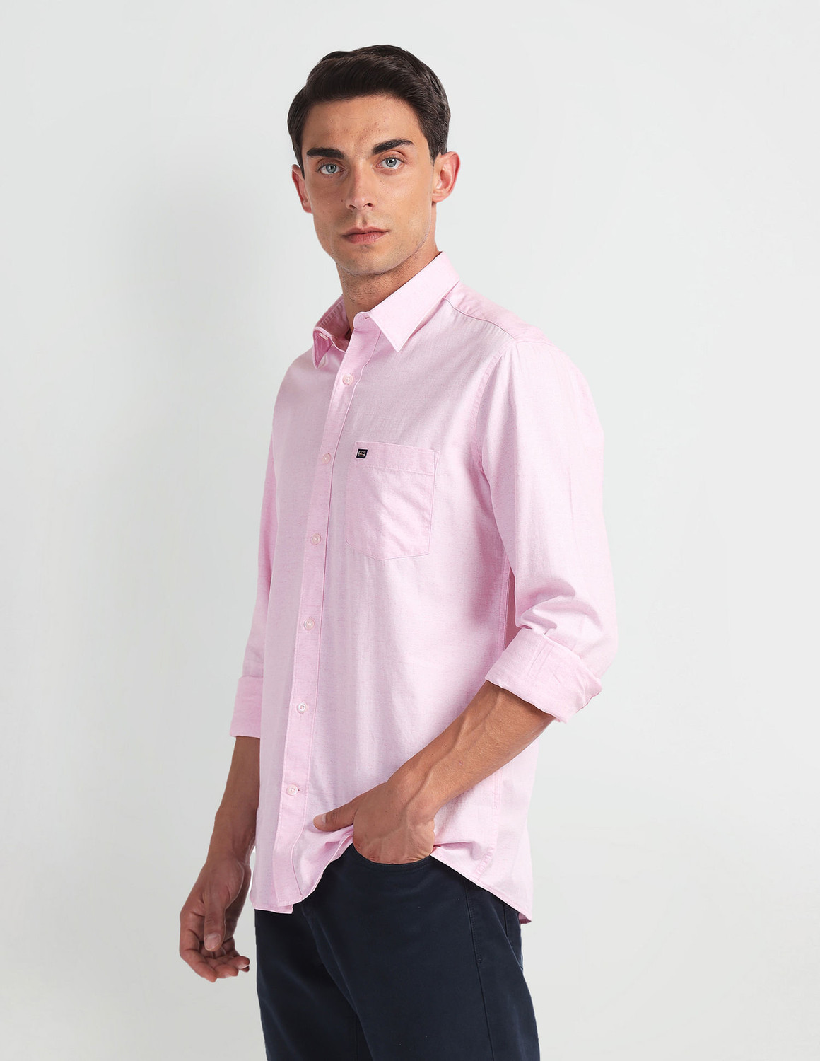Image of Arrow Sport Men Solid Casual Pink Shirt