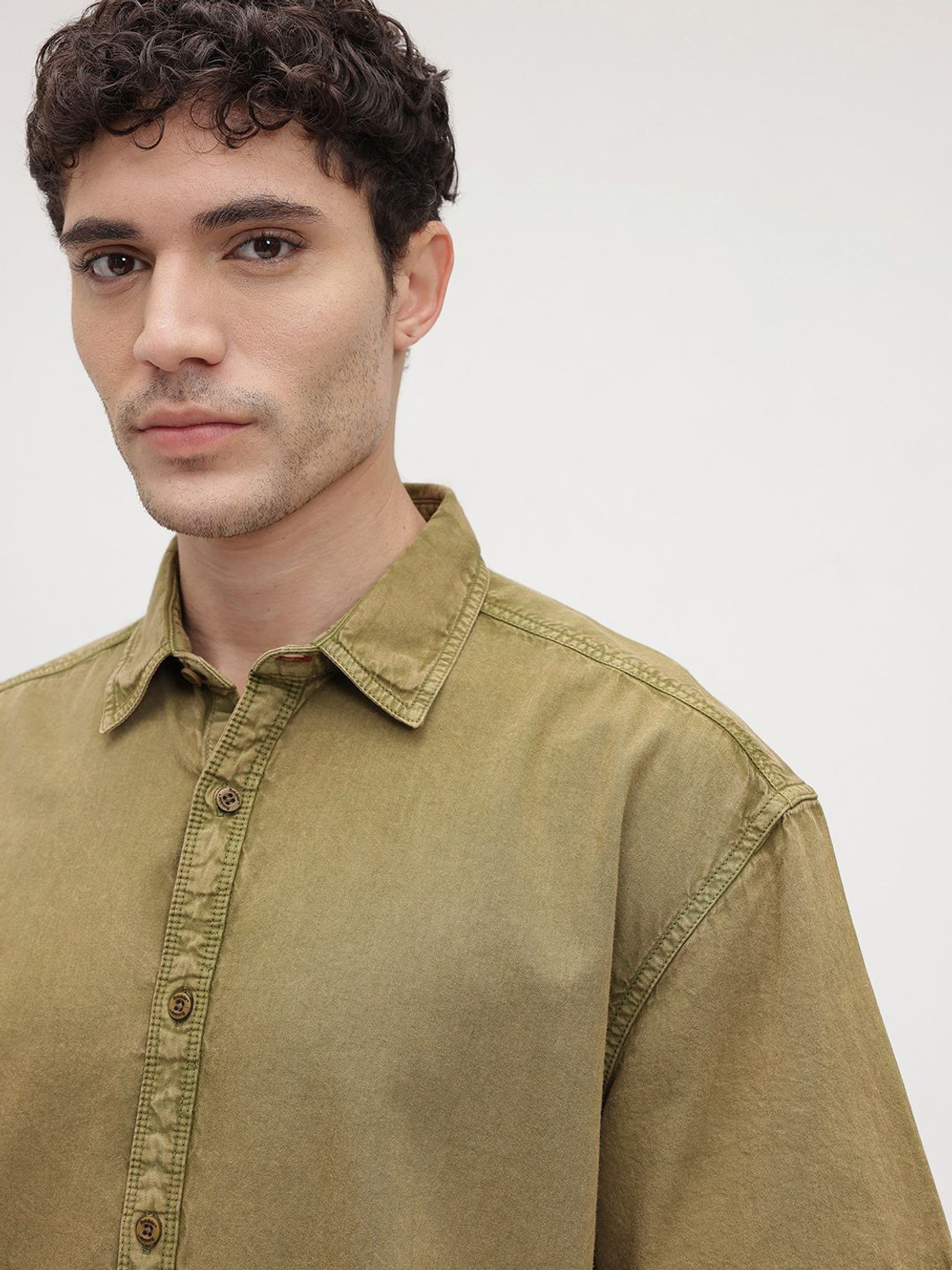 Image of Roadster Men Solid Casual Green Shirt