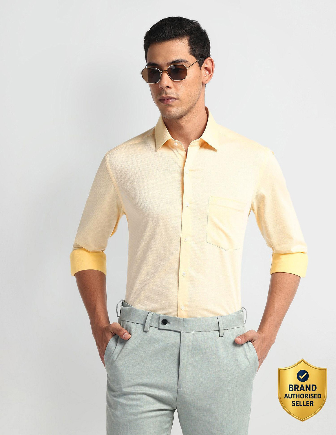 Image of ARROW Men Self Design Formal Yellow Shirt