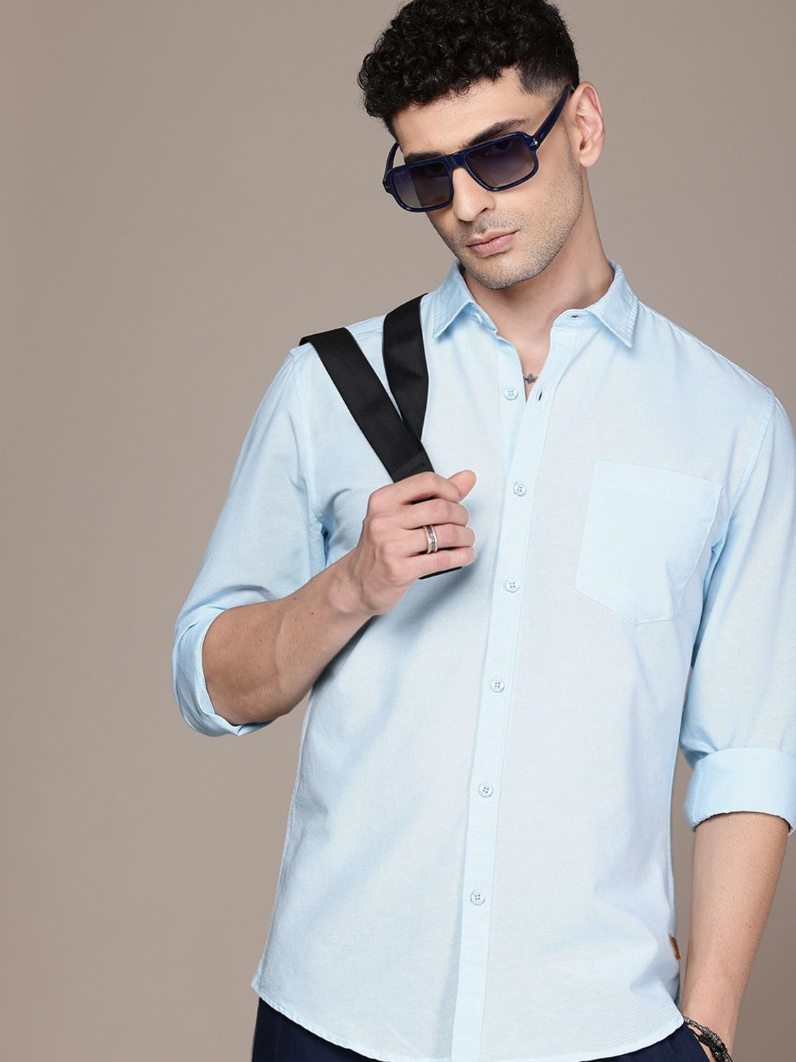 Image of Roadster Men Solid Casual Blue Shirt