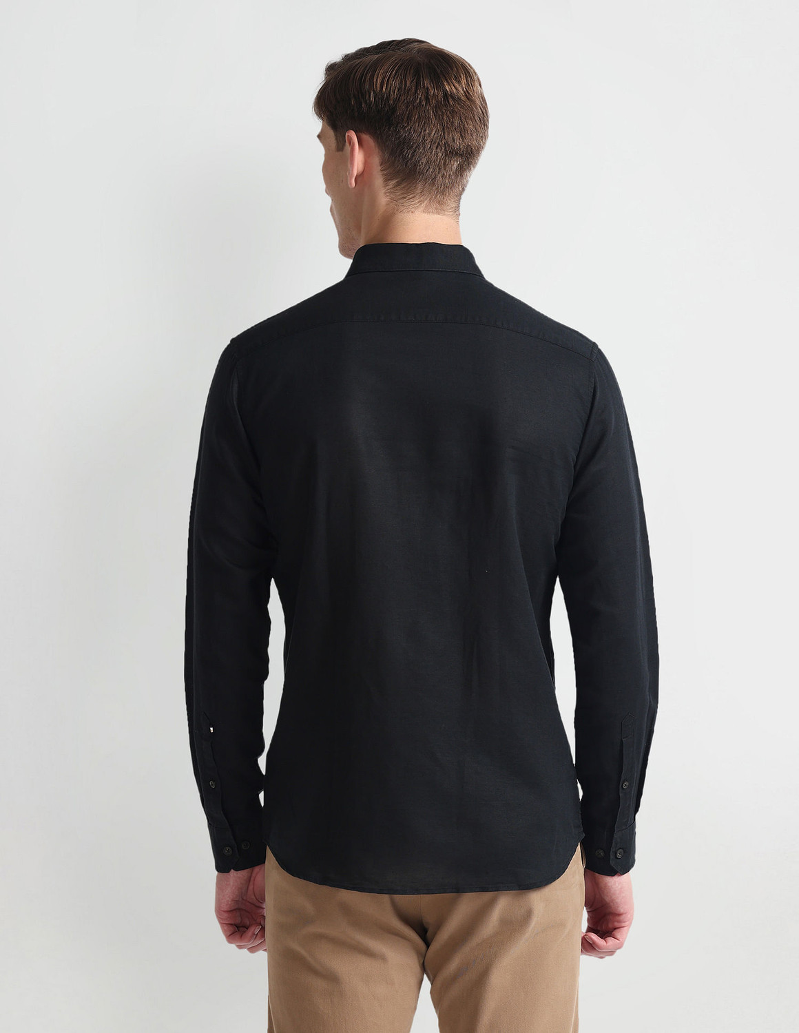 Image of Arrow Sport Men Solid Casual Black Shirt