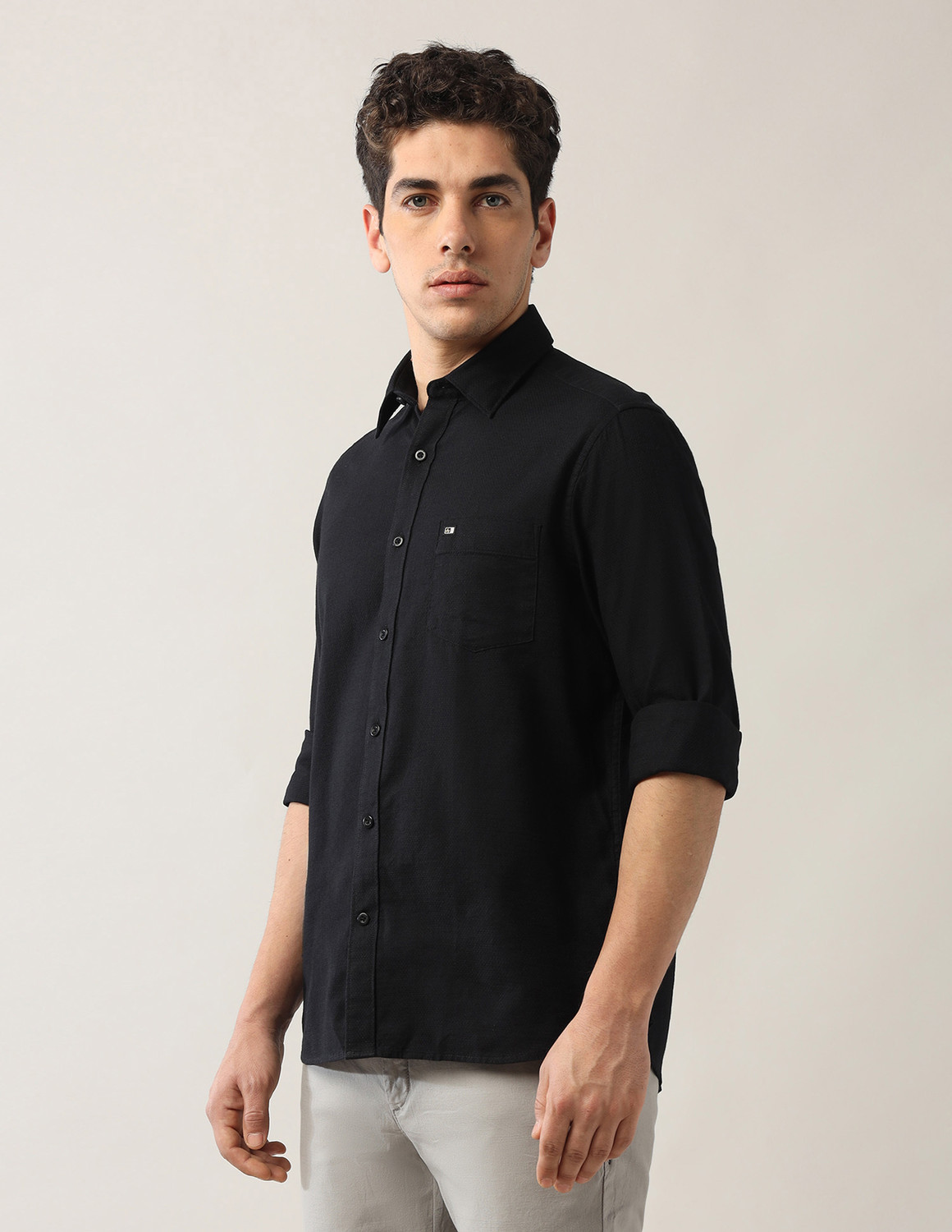 Image of Arrow Sport Men Solid Casual Black Shirt