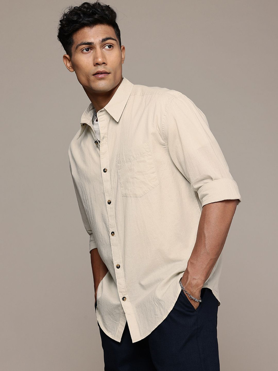 Image of Roadster Men Solid Casual Beige Shirt