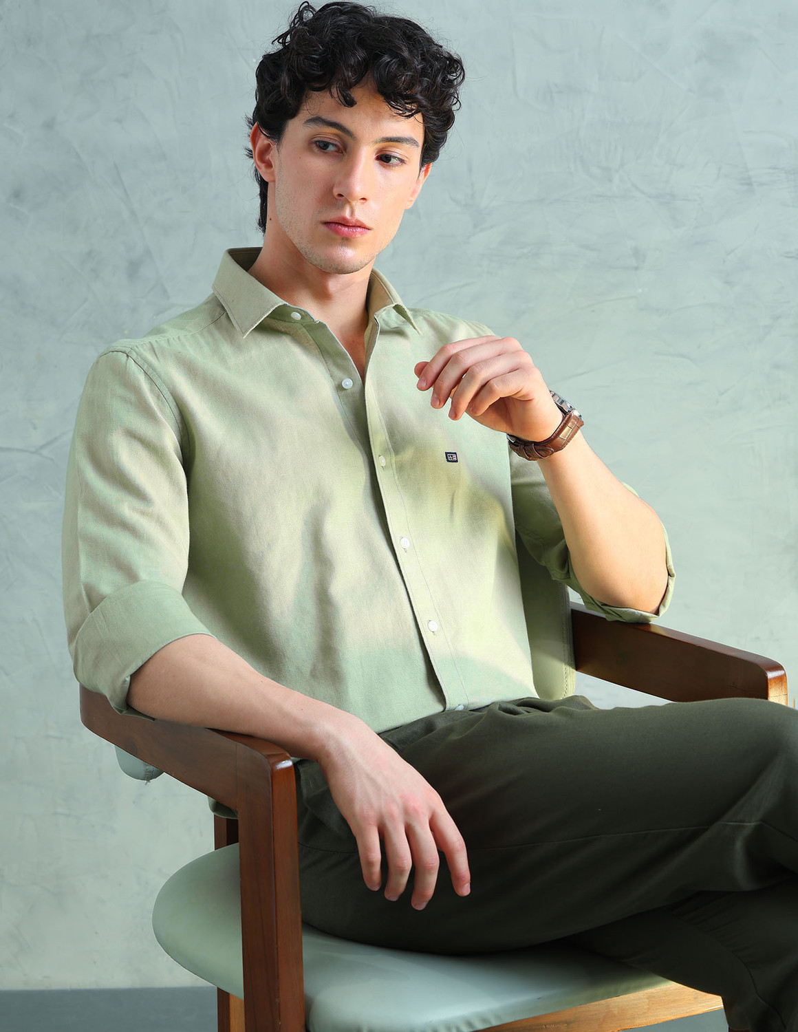 Image of Arrow Sport Men Solid Formal Green Shirt