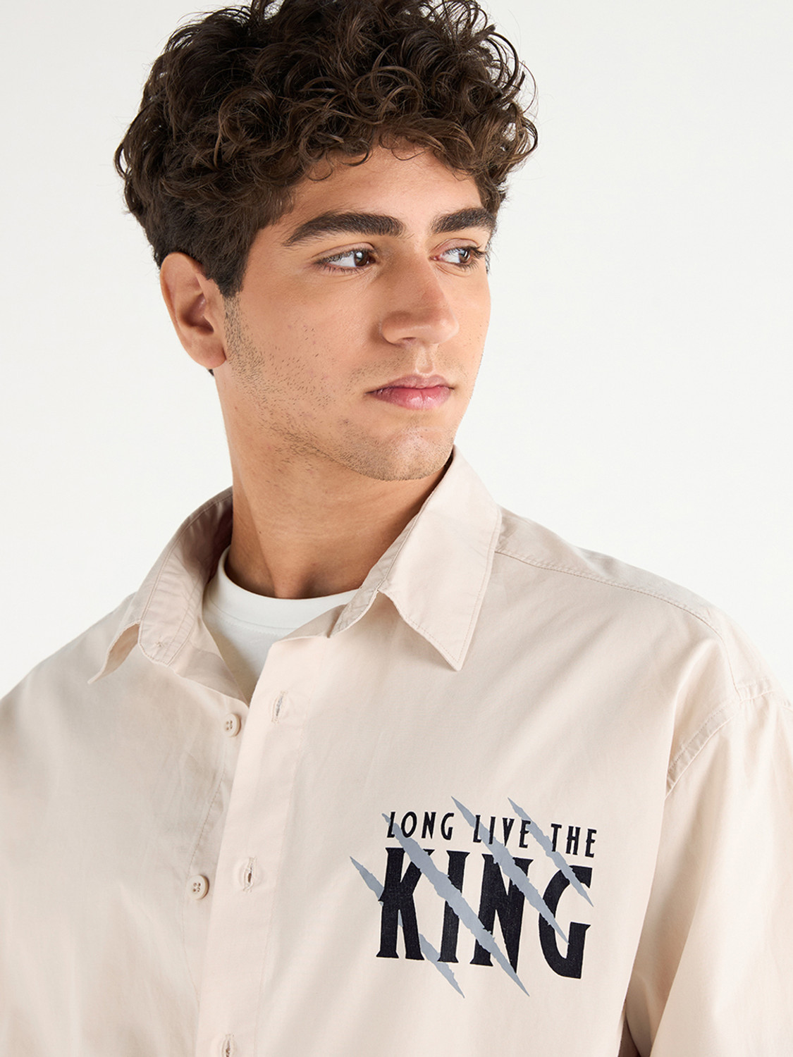Image of BEWAKOOF Men Graphic Print Casual Beige Shirt