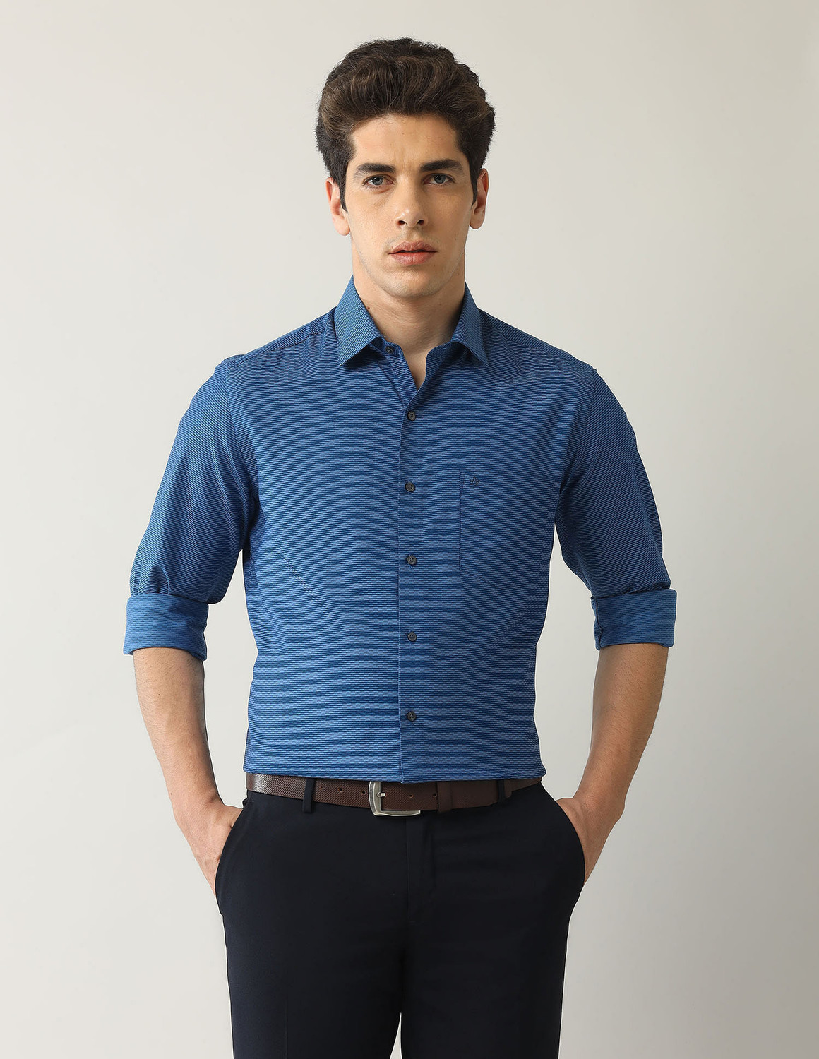 Image of ARROW Men Self Design Formal Blue Shirt